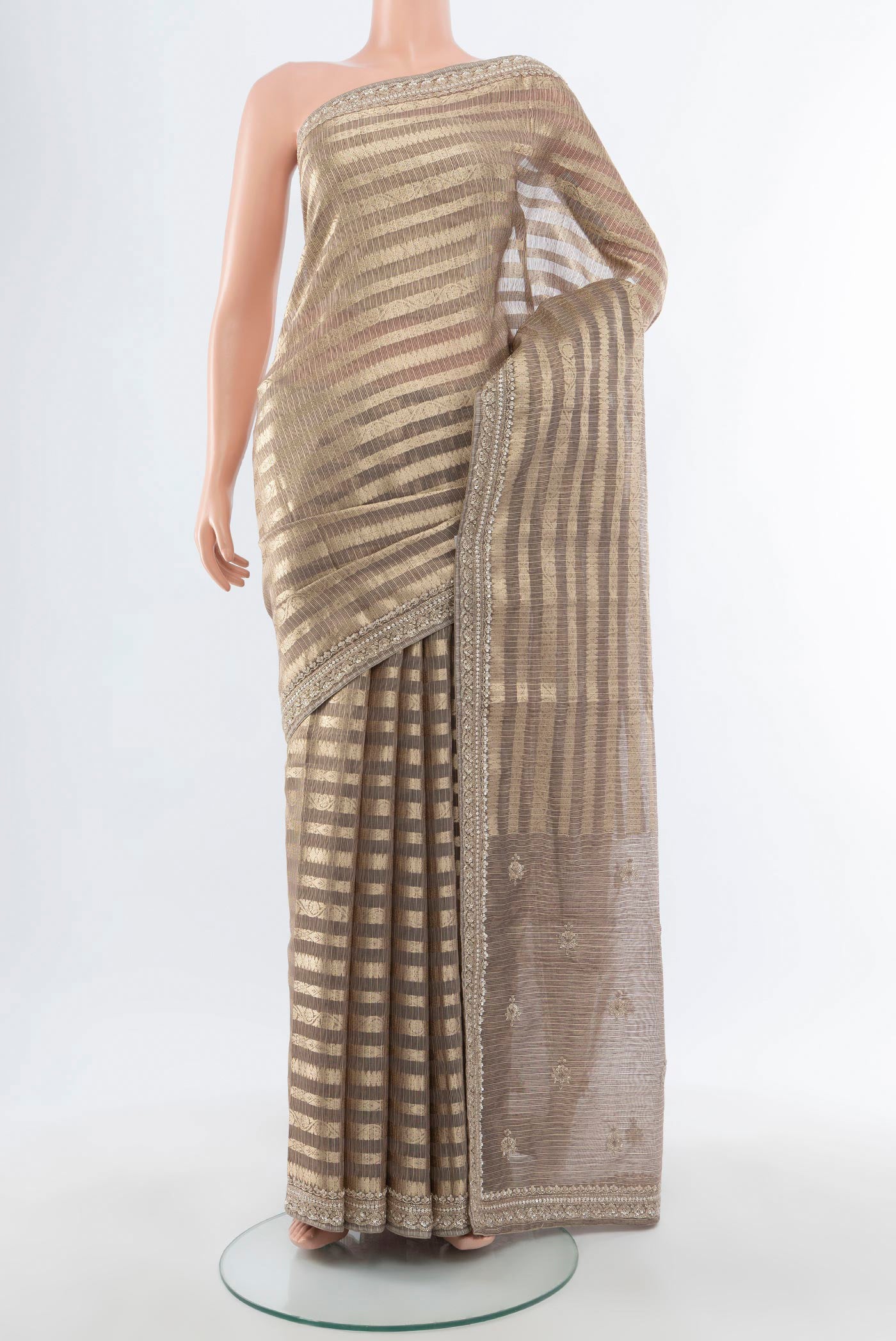 Golden Art Silk Saree with Stripes on the body and Embroidery Border.  displayed on a mannequin