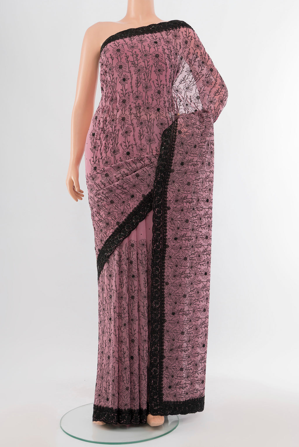 Teal Embroidery Net Saree with Embroidery on the body and Silk Border.  displayed on a mannequin