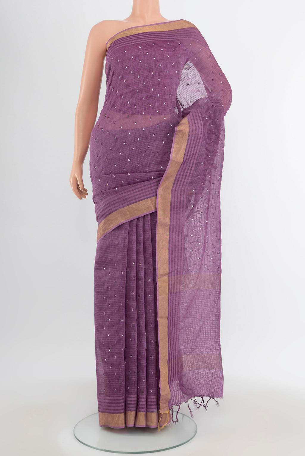 Violet Tussar Silk Saree with Embroidery on the body and Silk Border.  displayed on a mannequin
