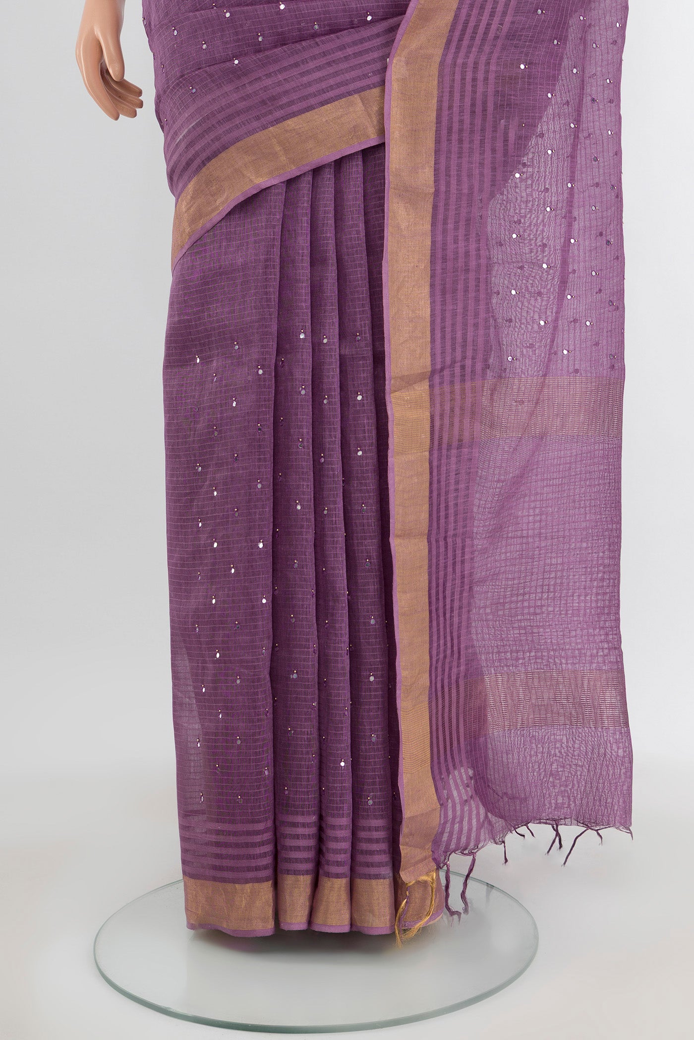 Pleats and pallu of Violet Tussar Silk Saree with Embroidery on the body and Silk Border. 