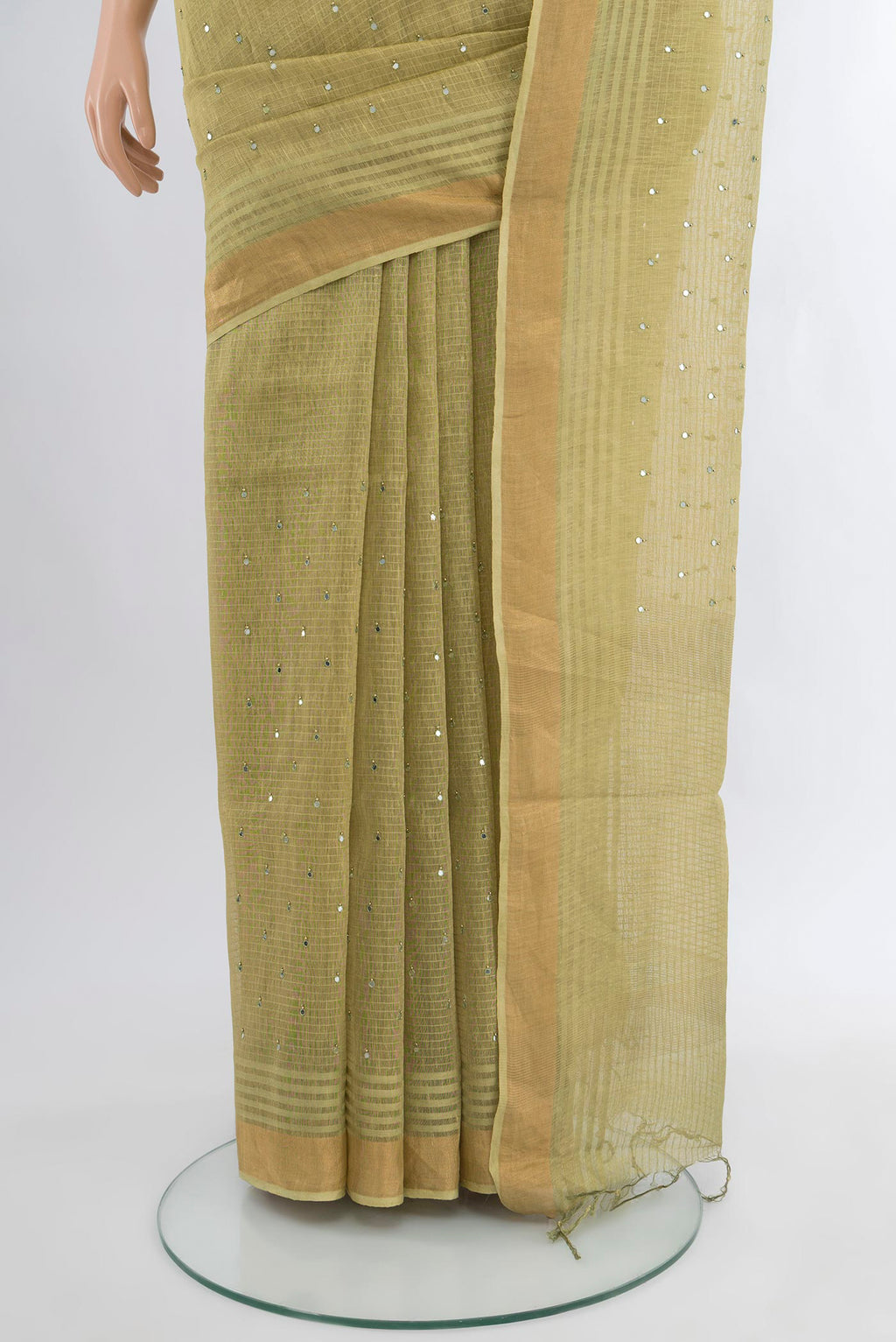 Pleats and pallu of Light Green Tussar Silk Saree with Embroidery on the body and Zari Border. 