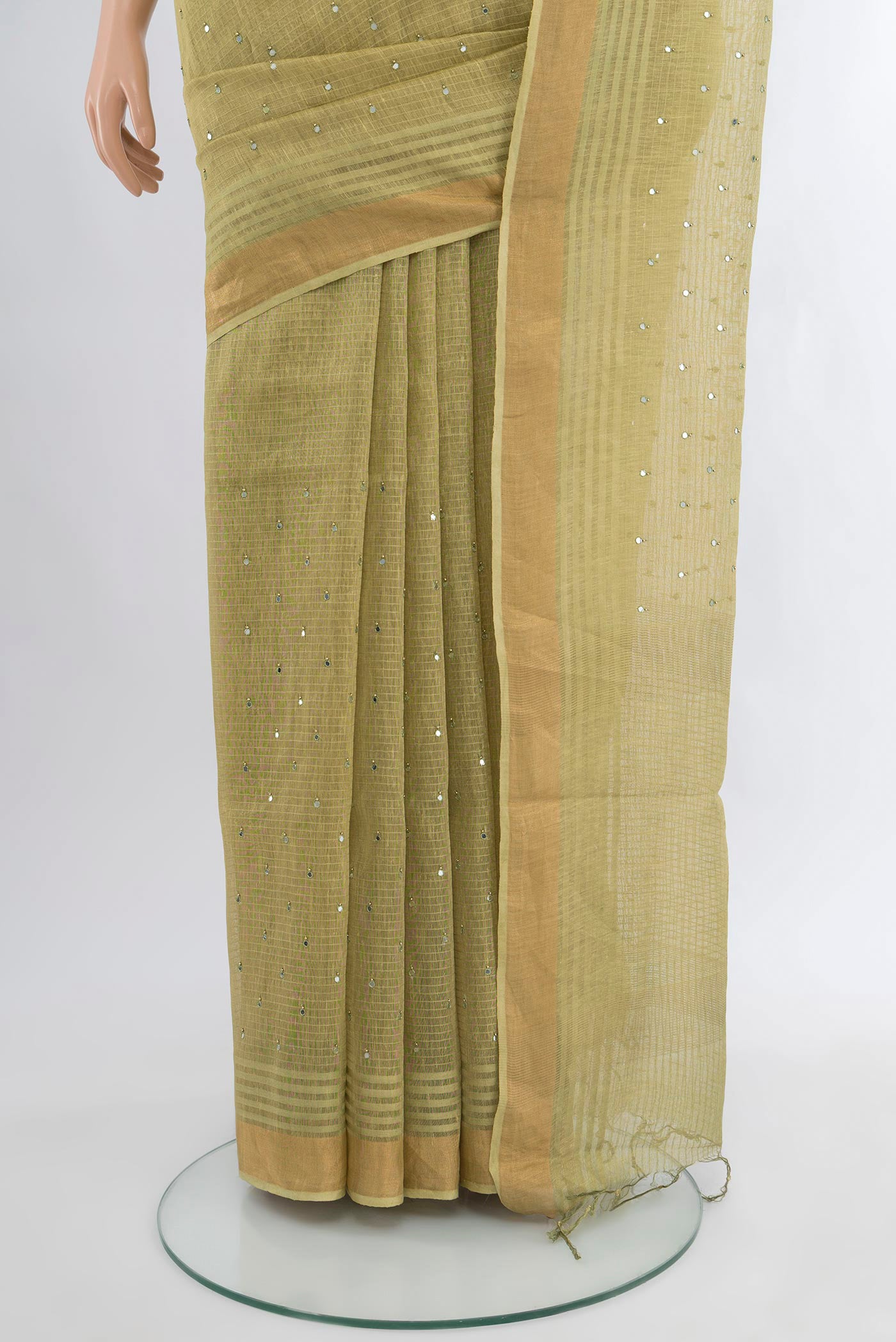 Pleats and pallu of Light Green Tussar Silk Saree with Embroidery on the body and Zari Border. 