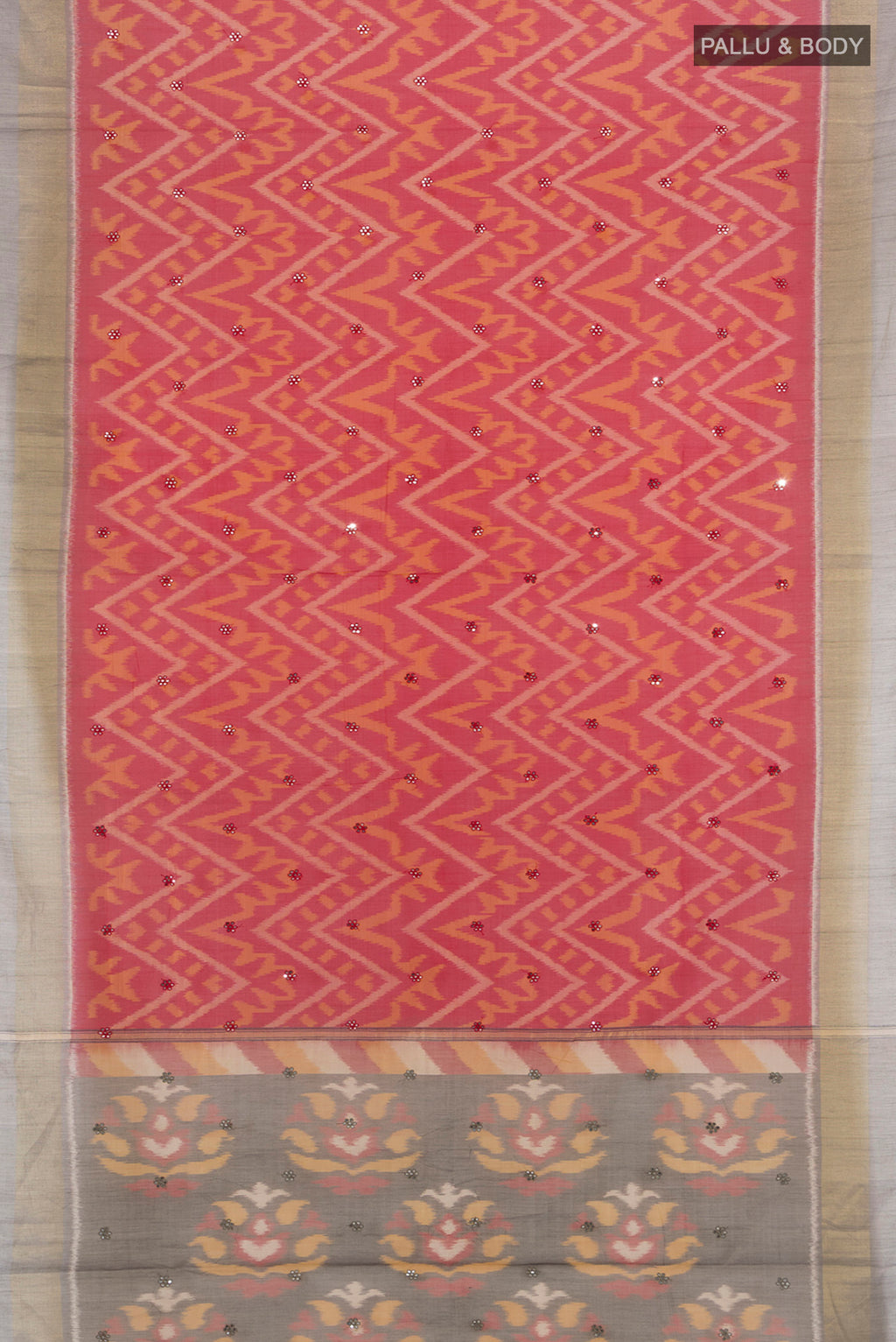 Flat view of Red Silk Cotton Saree with Ikat design on the body and Zari Border. 