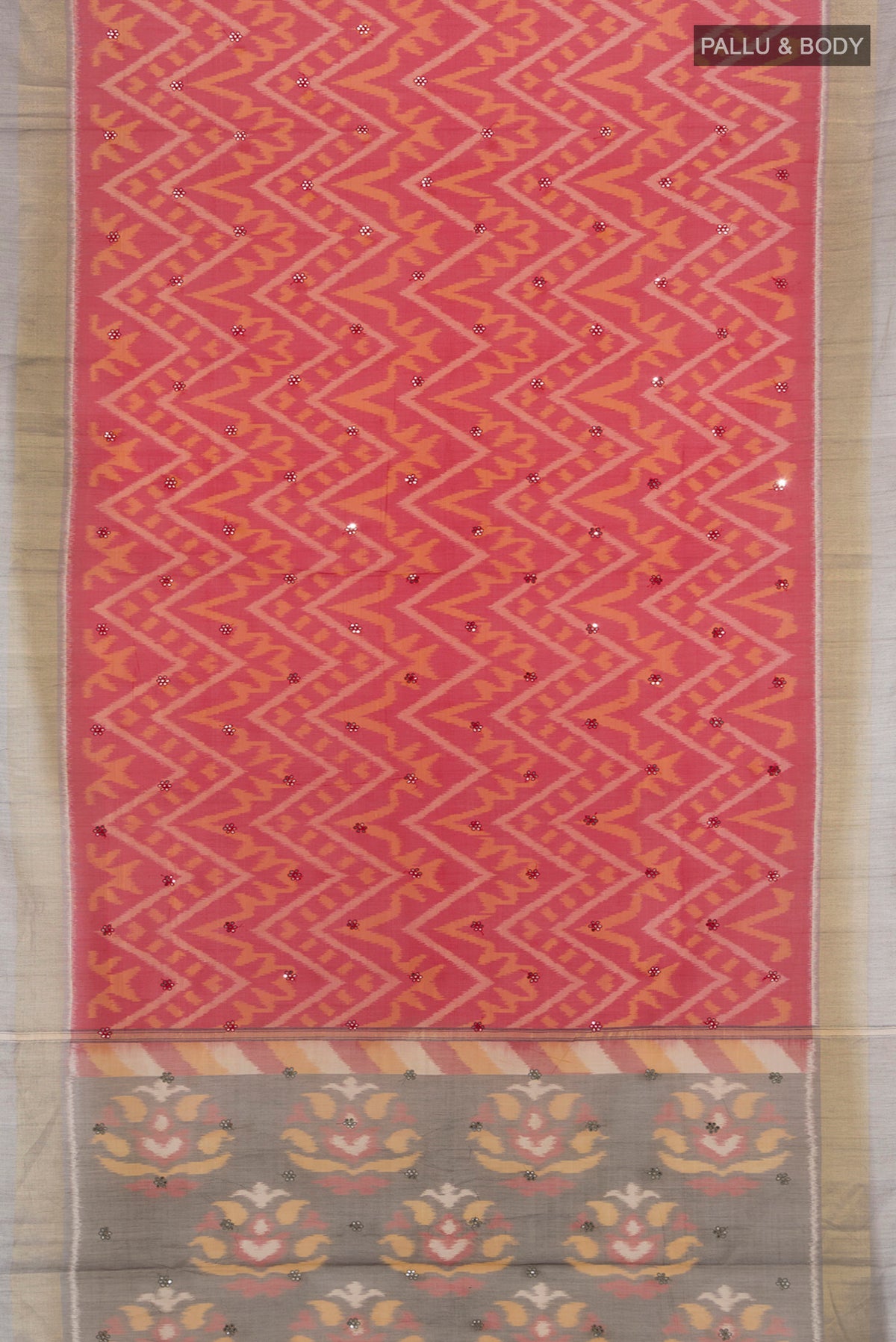 Flat view of Red Silk Cotton Saree with Ikat design on the body and Zari Border. 