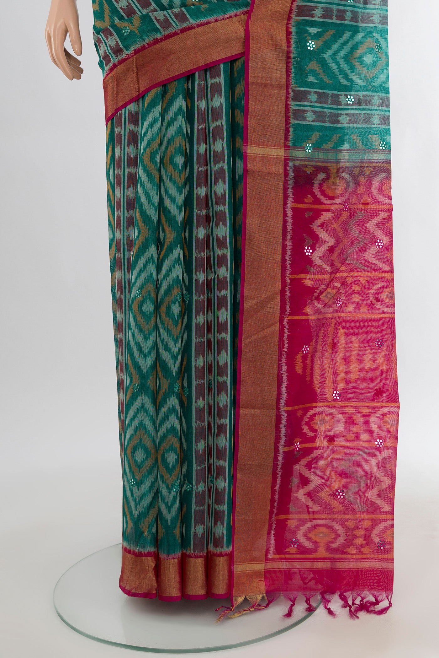 Pleats and pallu of Sea Green Silk Cotton Saree with Ikat design on the body and Zari Border. 