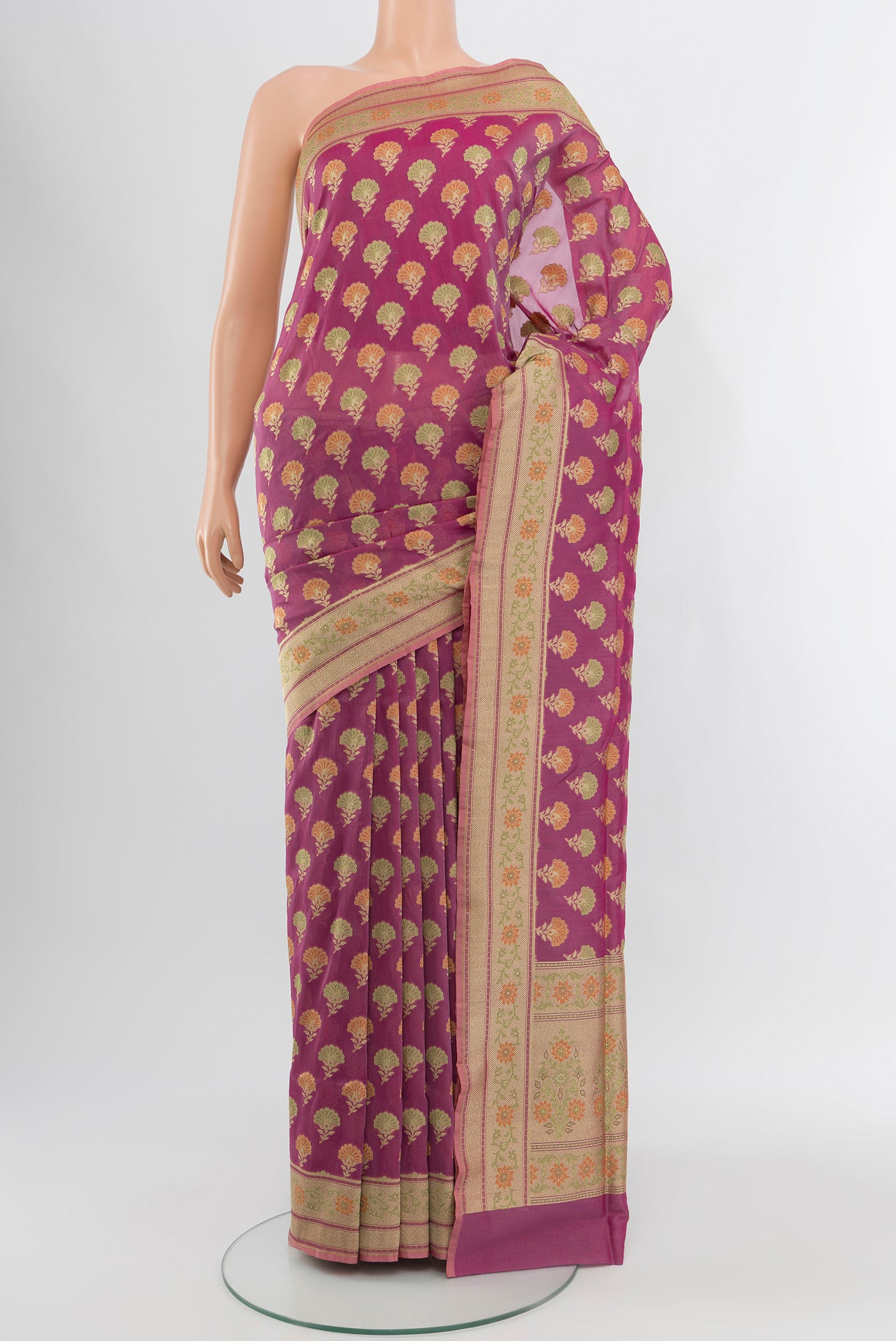 Purple Banarasi Silk Saree with Zari Butta on the body and Zari Border.  displayed on a mannequin