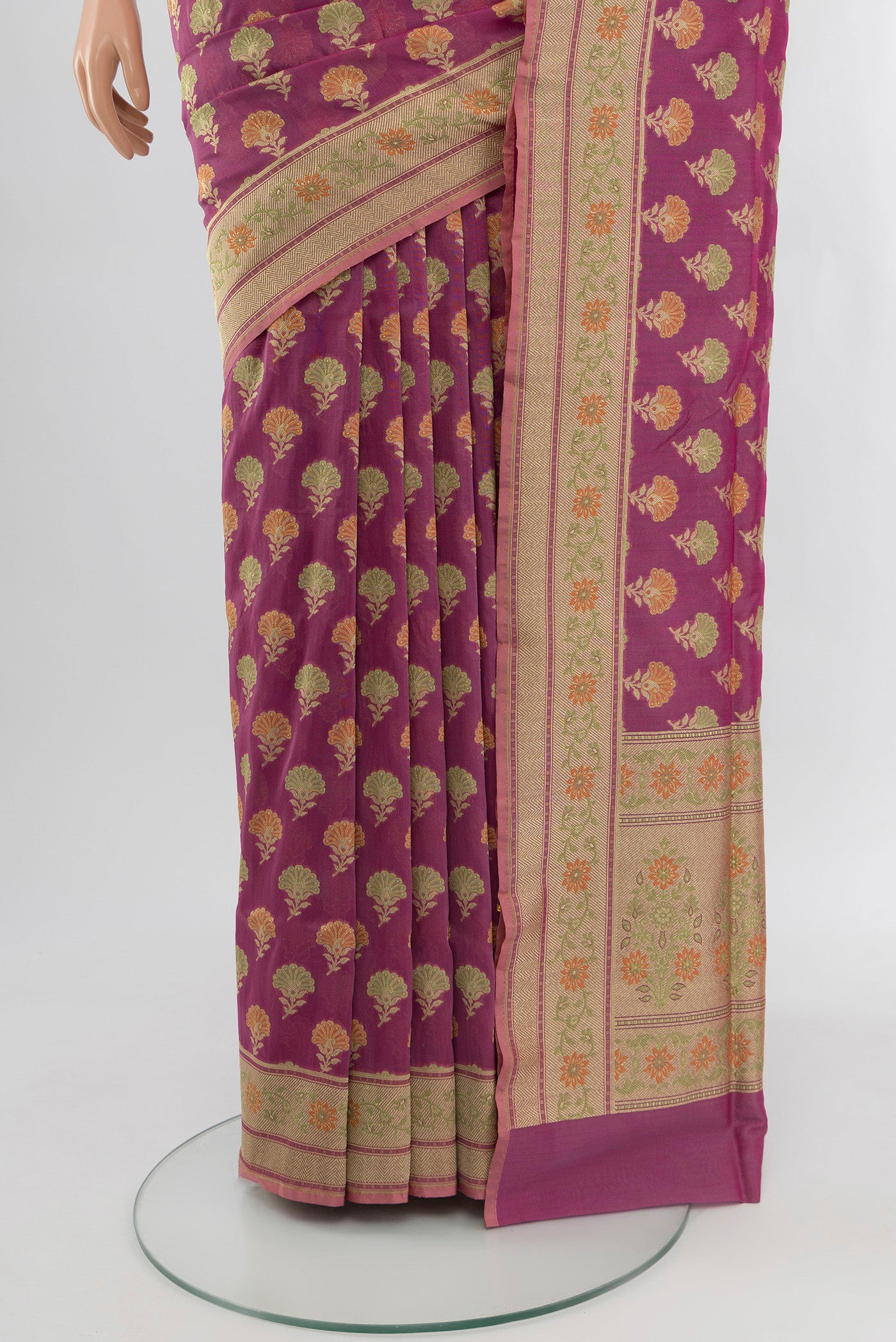 Pleats and pallu of Purple Banarasi Silk Saree with Zari Butta on the body and Zari Border. 