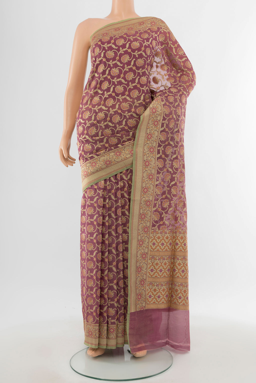 Bronze Banarasi Silk Saree with Zari Butta on the body and Silk Border.  displayed on a mannequin