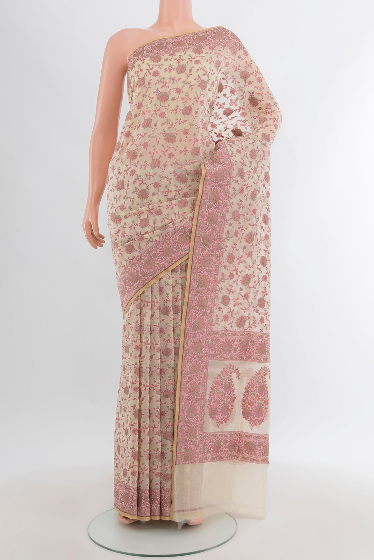 Cream Banarasi Silk Saree with Thread Butta on the body and Thread Border.  displayed on a mannequin