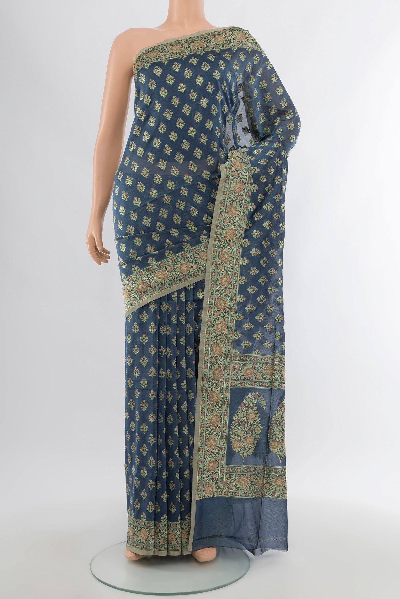 Davys Grey Banarasi Silk Saree with Zari Butta on the body and Zari Border.  displayed on a mannequin
