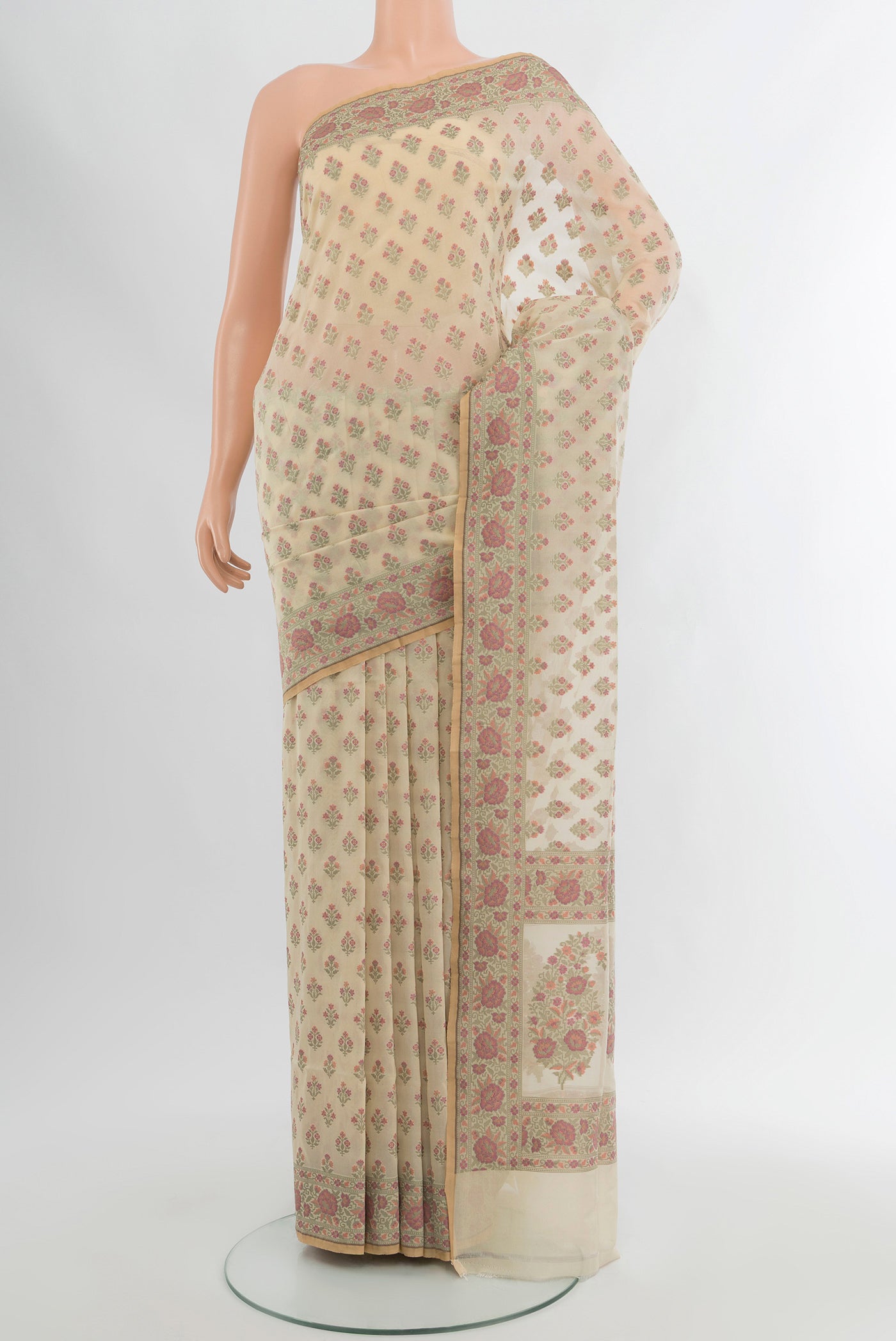 Beige Banarasi Silk Saree with Thread Butta on the body and Zari Border.  displayed on a mannequin