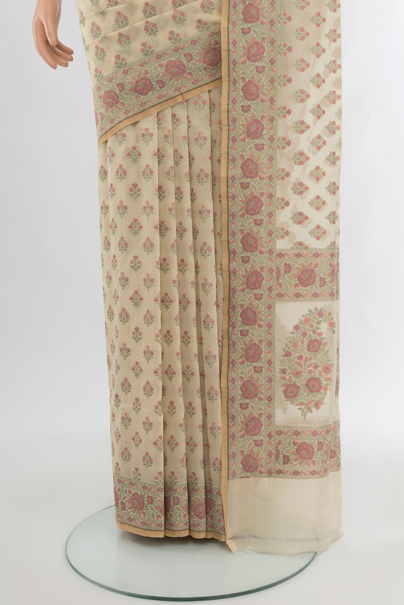Pleats and pallu of Beige Banarasi Silk Saree with Thread Butta on the body and Zari Border. 