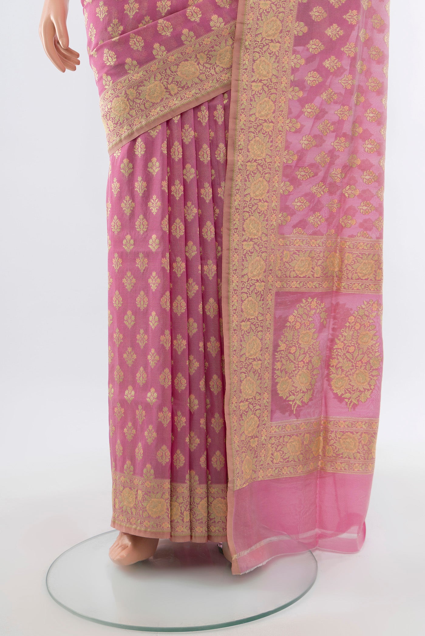 Pleats and pallu of Rose Gold Banarasi Silk Saree with Zari Butta on the body and Silk Border. 