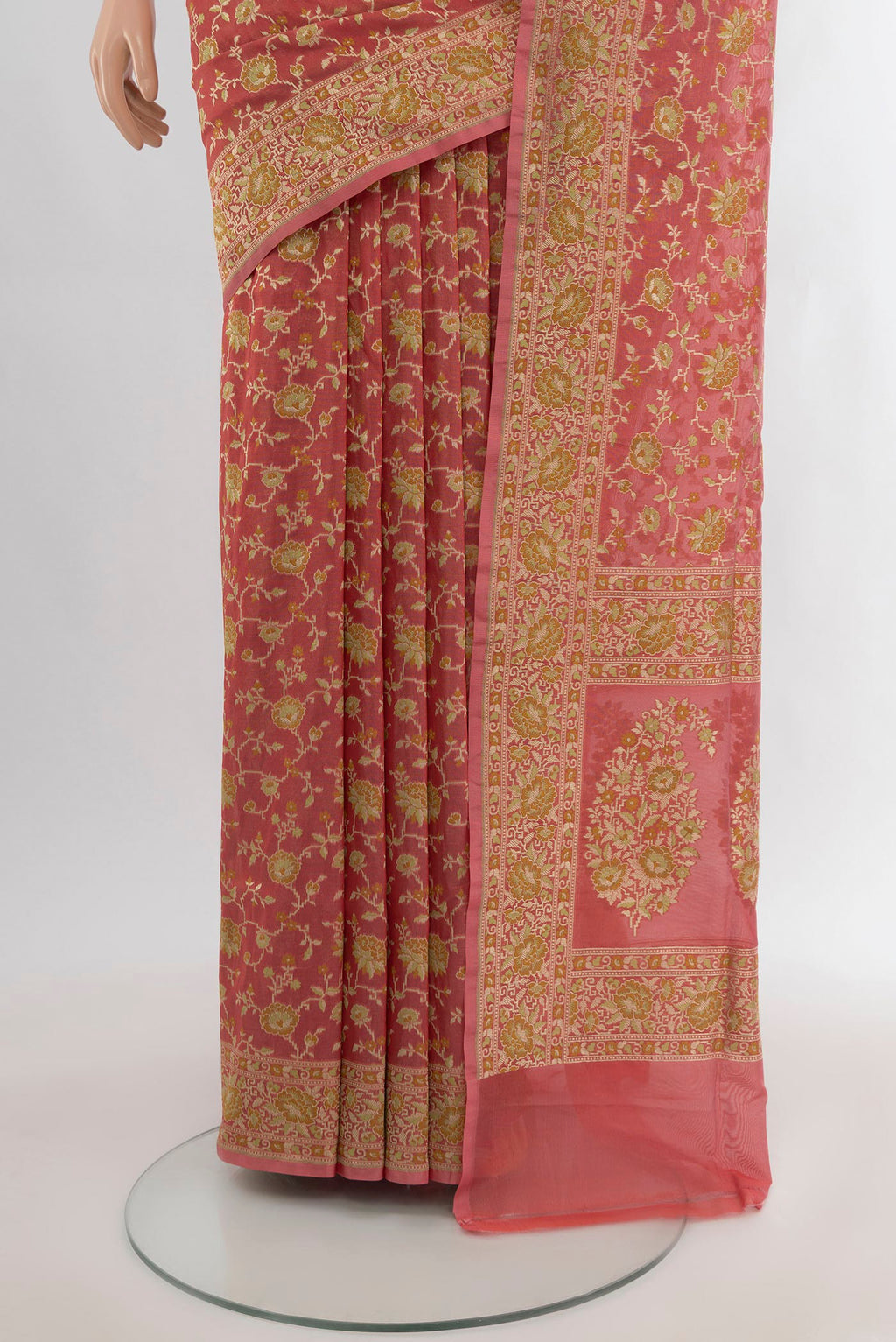 Pleats and pallu of Peach Banarasi Silk Saree with Zari And Thread Butta on the body and Zari Border. 