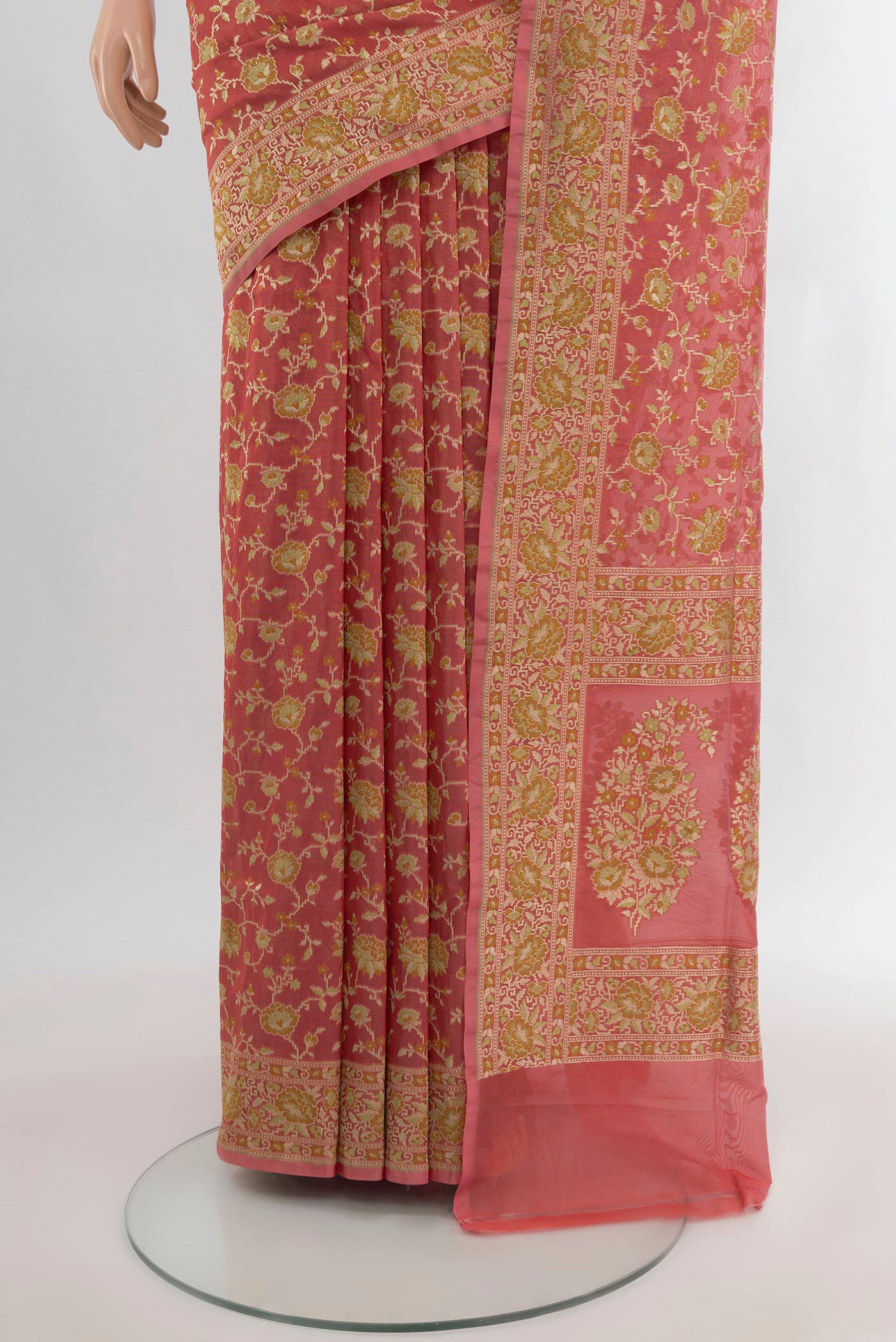 Pleats and pallu of Peach Banarasi Silk Saree with Zari And Thread Butta on the body and Zari Border. 