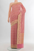 Rose pink Banarasi Silk Saree with Zari Brocade on the body and Zari Border.  displayed on a mannequin