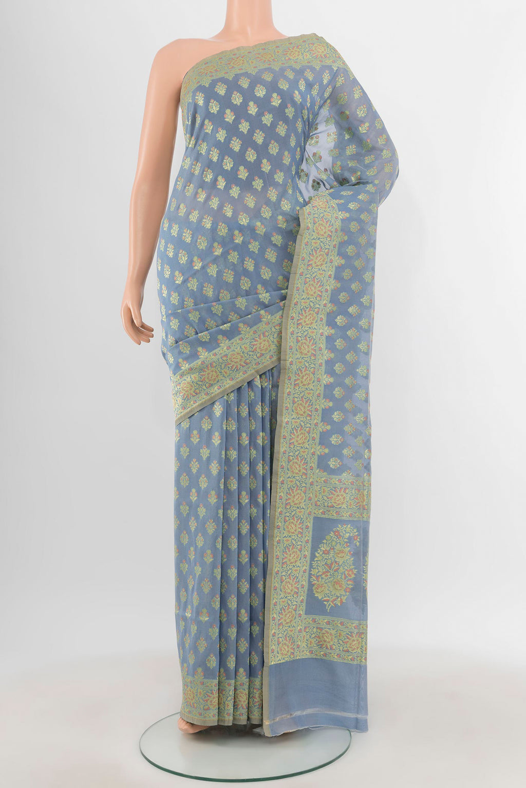 Light Blue Banarasi Silk Saree with Zari Butta on the body and Zari Border.  displayed on a mannequin