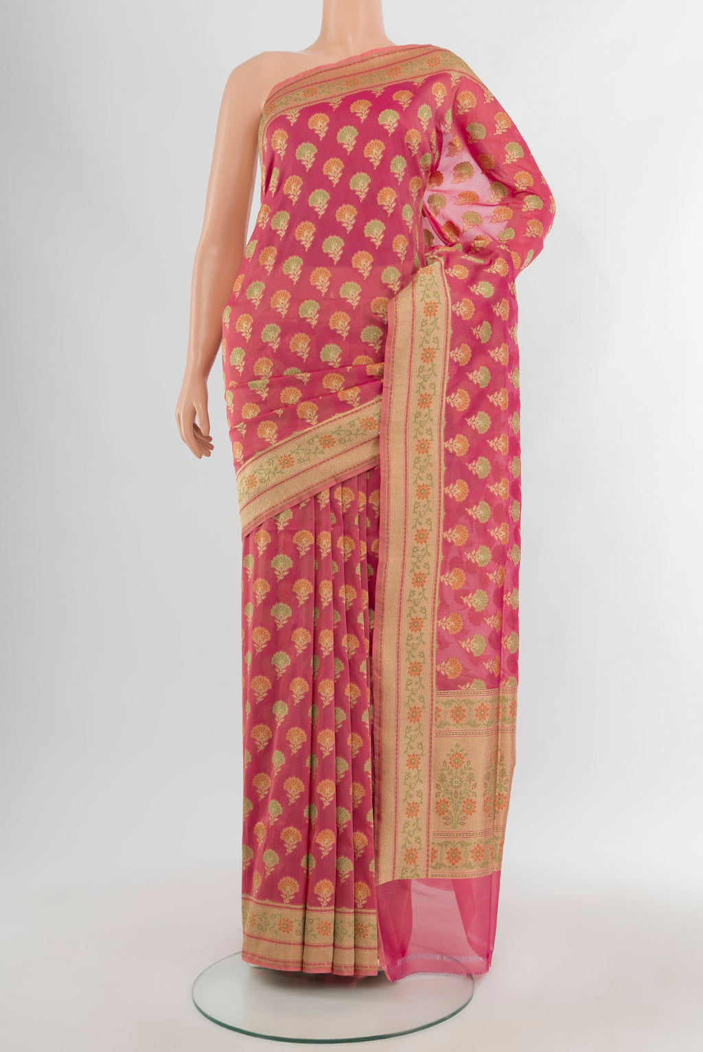 Pink Banarasi Silk Saree with Zari And Thread Butta on the body and Zari Border.  displayed on a mannequin