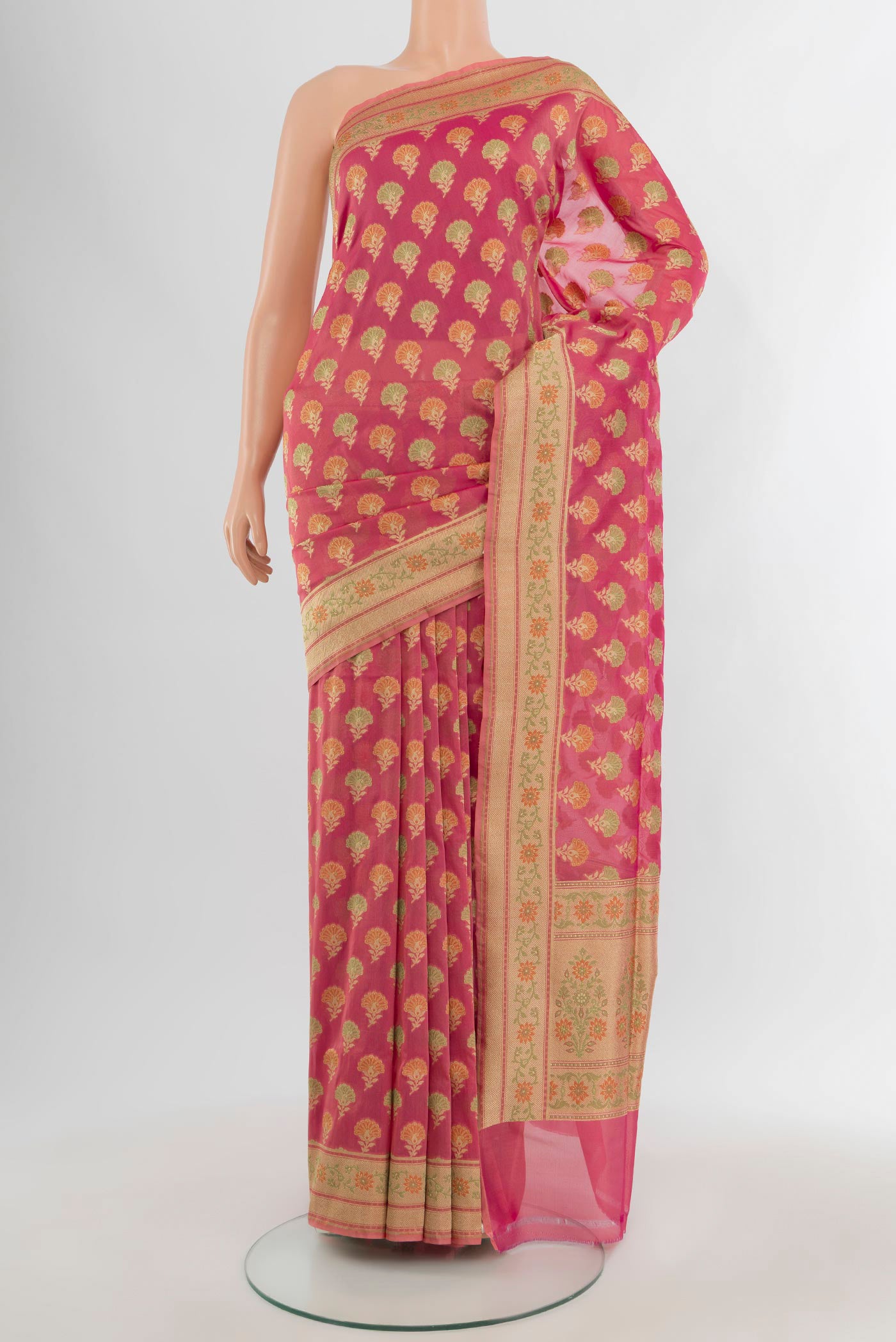 Pink Banarasi Silk Saree with Zari And Thread Butta on the body and Zari Border.  displayed on a mannequin