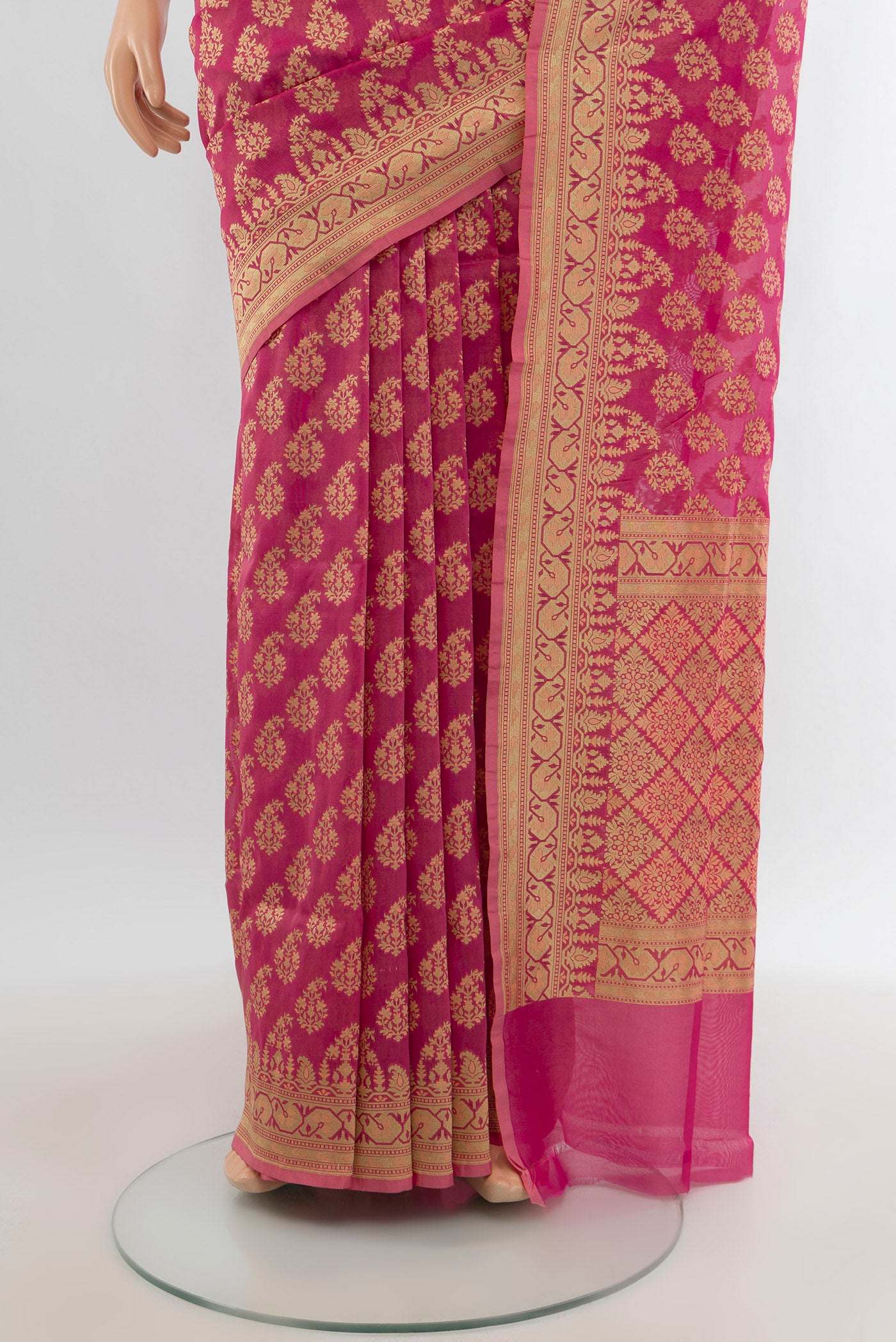 Pleats and pallu of Pink Banarasi Silk Saree with Zari And Thread Butta on the body and Zari Border. 