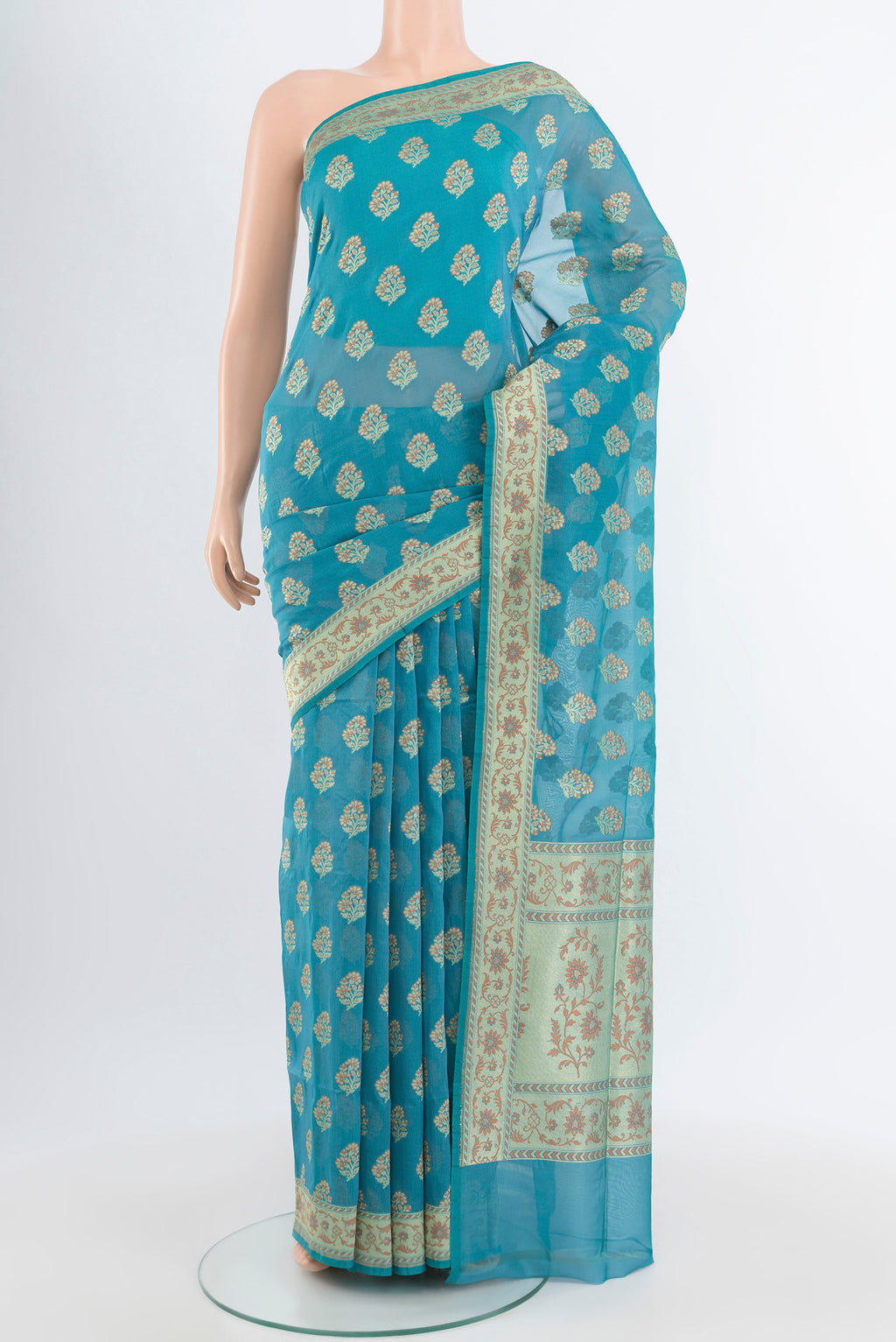 Light Blue Banarasi Silk Saree with Zari And Thread Butta on the body and Zari Border.  displayed on a mannequin