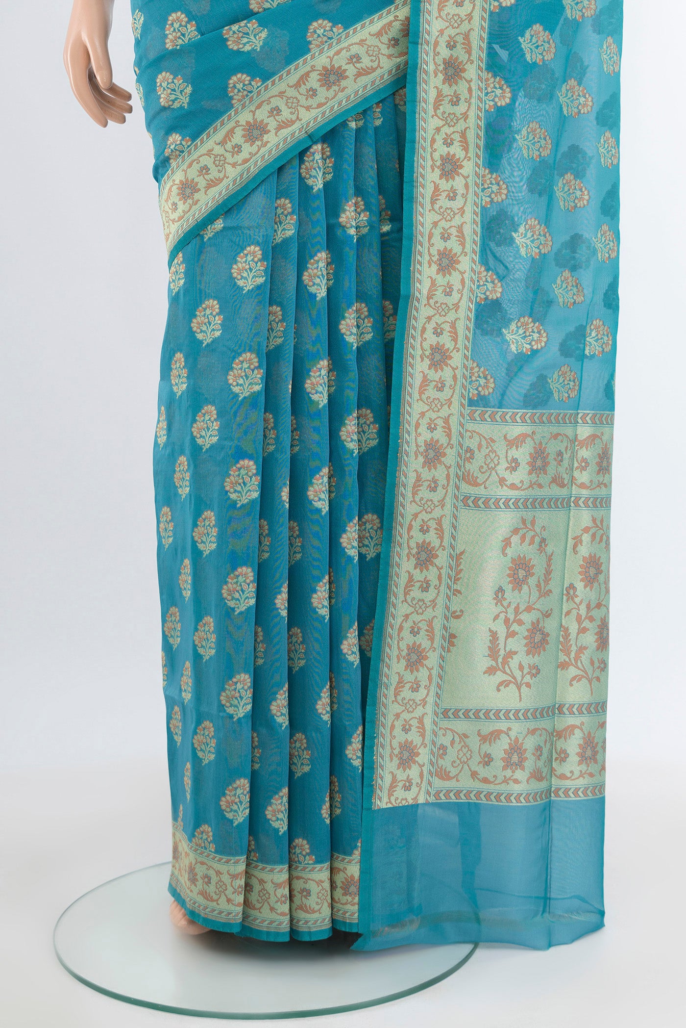 Pleats and pallu of Light Blue Banarasi Silk Saree with Zari And Thread Butta on the body and Zari Border. 