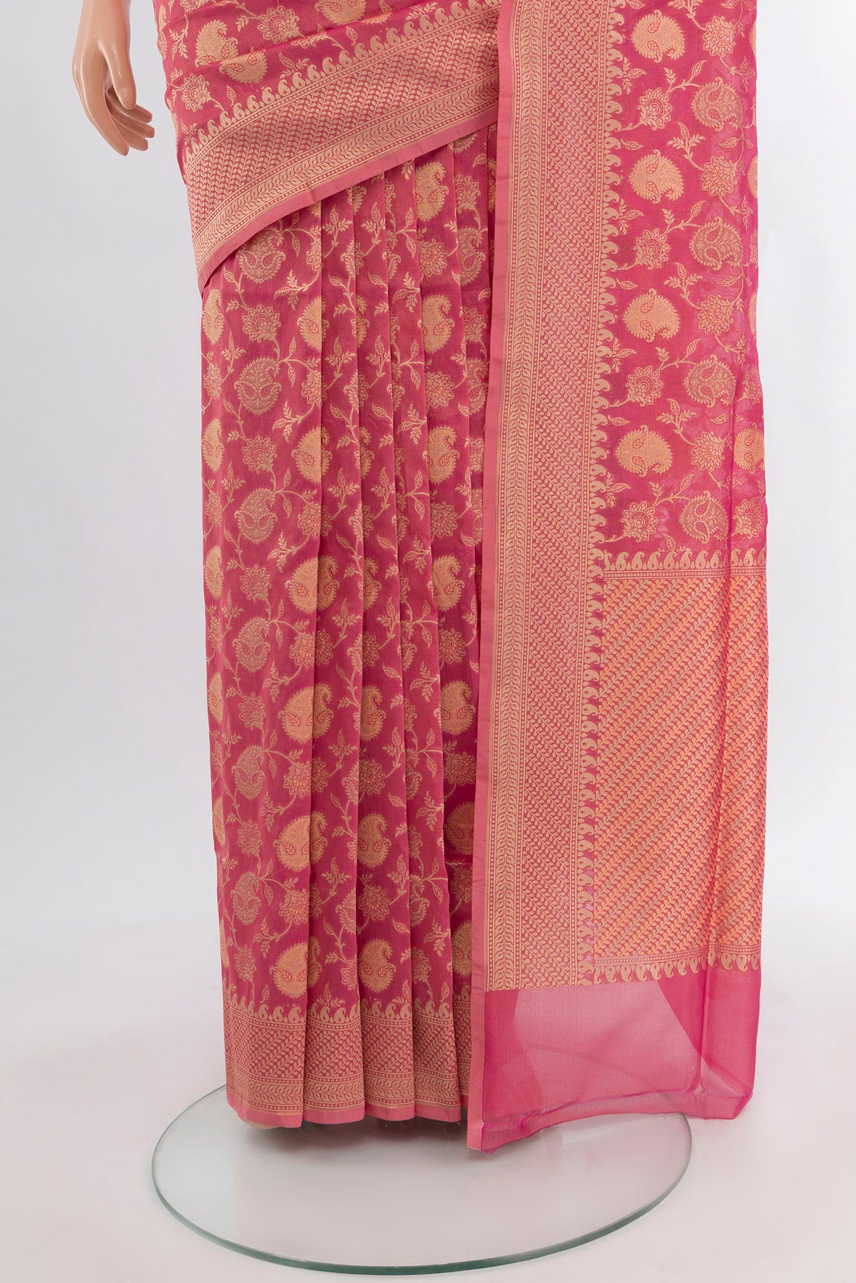 Pleats and pallu of Rose pink Banarasi Silk Saree with Zari And Thread Butta on the body and Zari Border. 