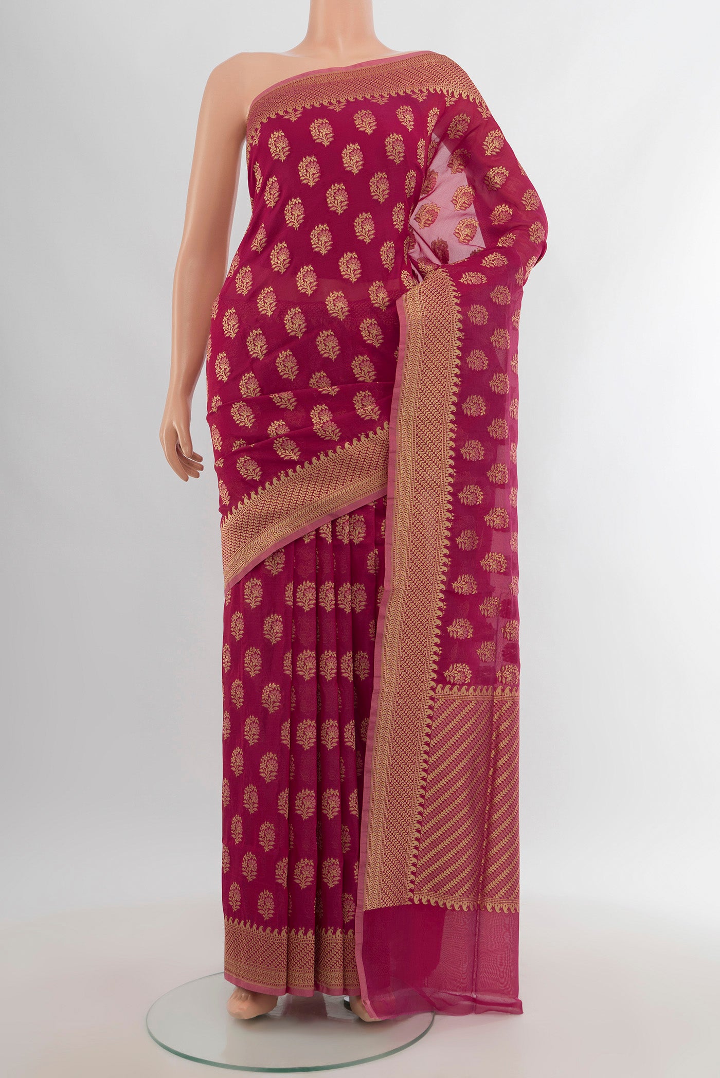 Dark Pink Banarasi Silk Saree with Zari Butta on the body and Zari Border.  displayed on a mannequin