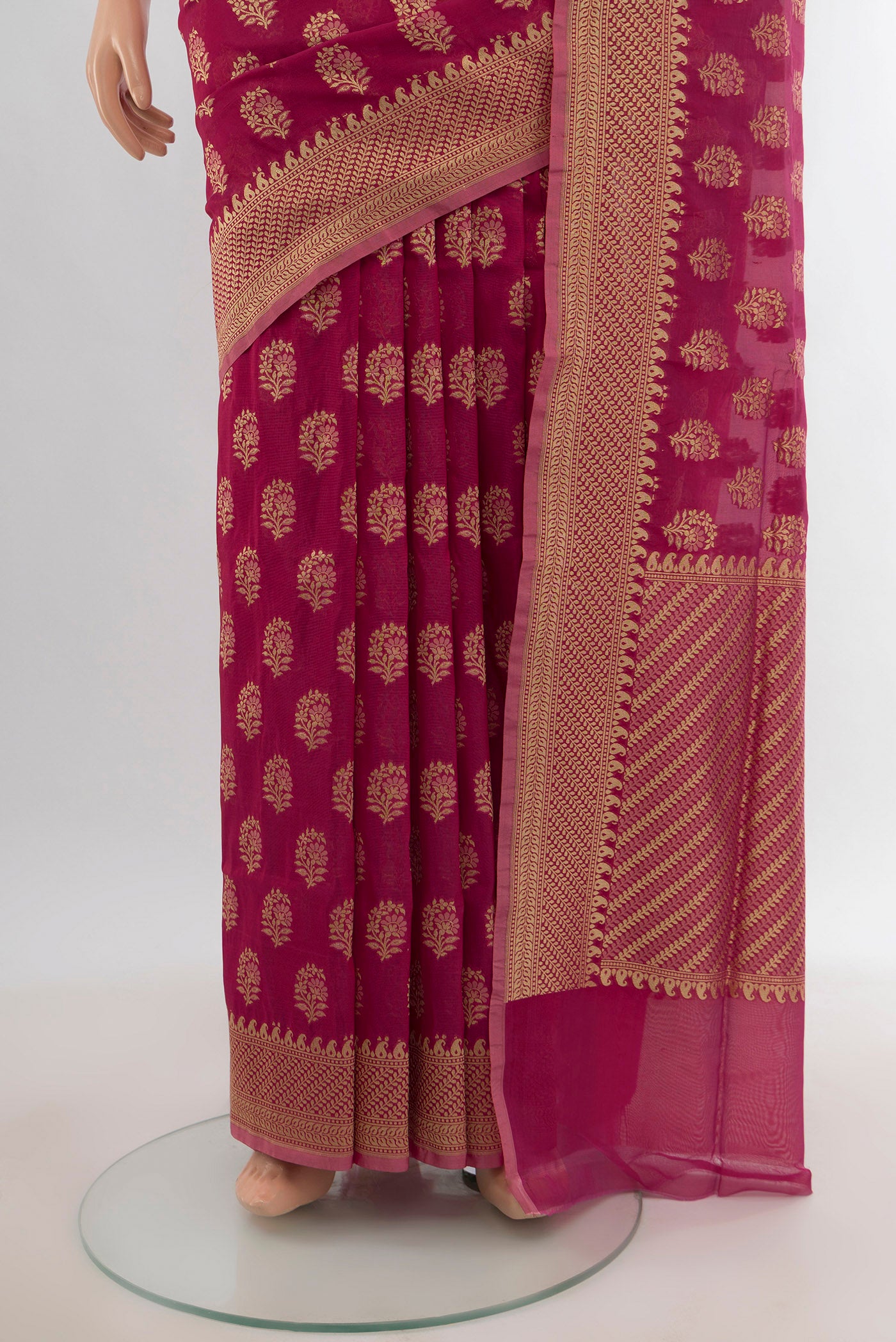 Pleats and pallu of Dark Pink Banarasi Silk Saree with Zari Butta on the body and Zari Border. 
