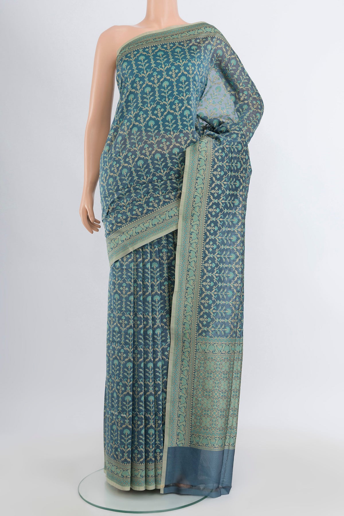 Davys Grey Banarasi Silk Saree with Zari And Thread Butta on the body and Zari Border.  displayed on a mannequin