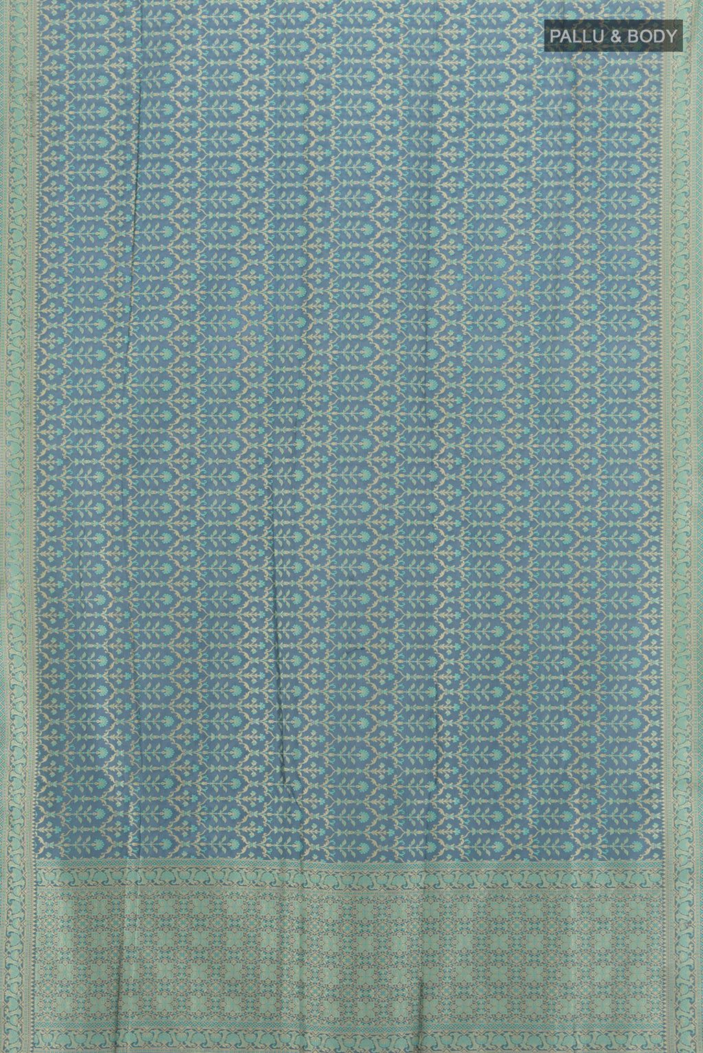 Flat view of Davys Grey Banarasi Silk Saree with Zari And Thread Butta on the body and Zari Border. 