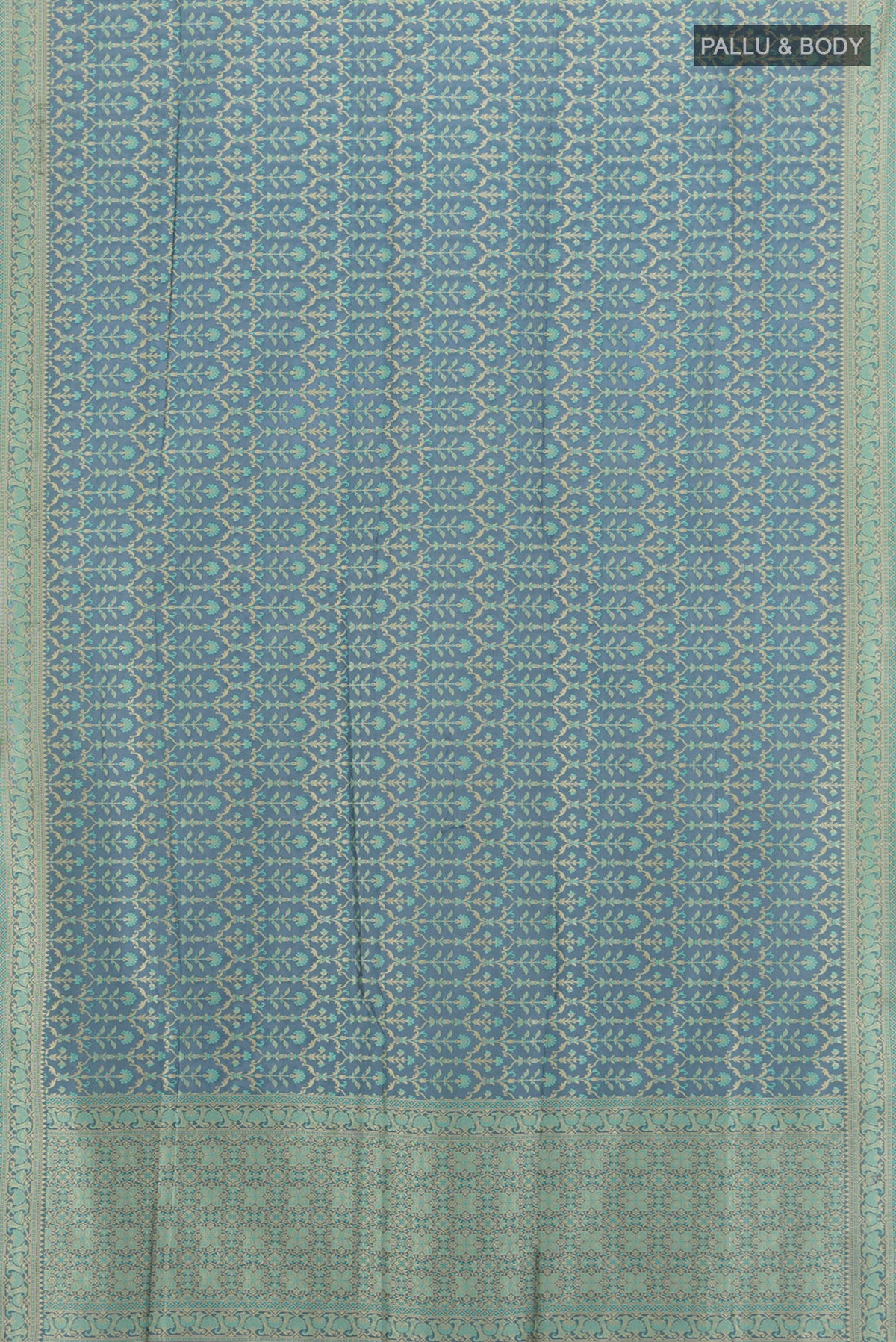 Flat view of Davys Grey Banarasi Silk Saree with Zari And Thread Butta on the body and Zari Border. 