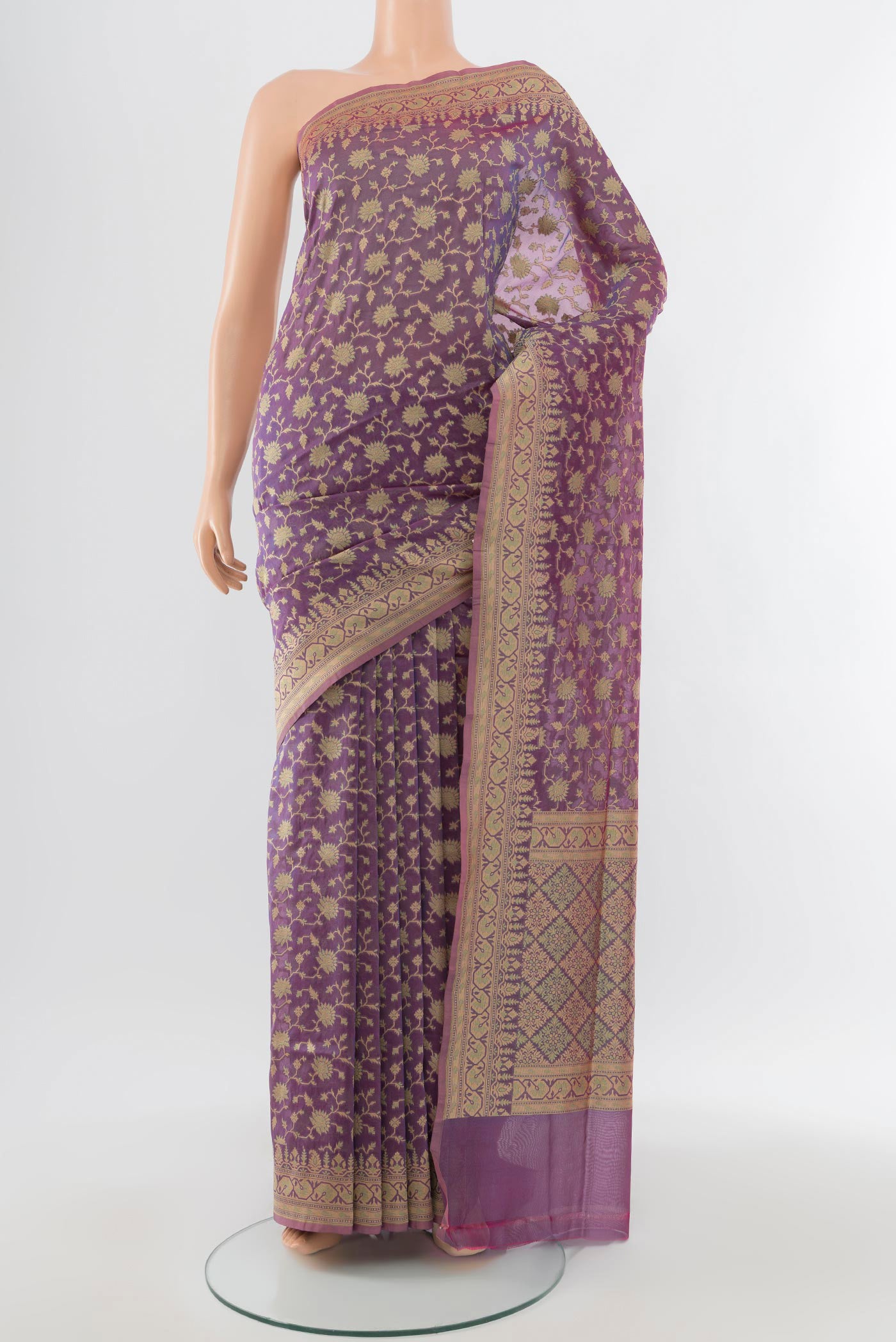 Lavender Banarasi Silk Saree with Zari Butta on the body and Silk Border.  displayed on a mannequin