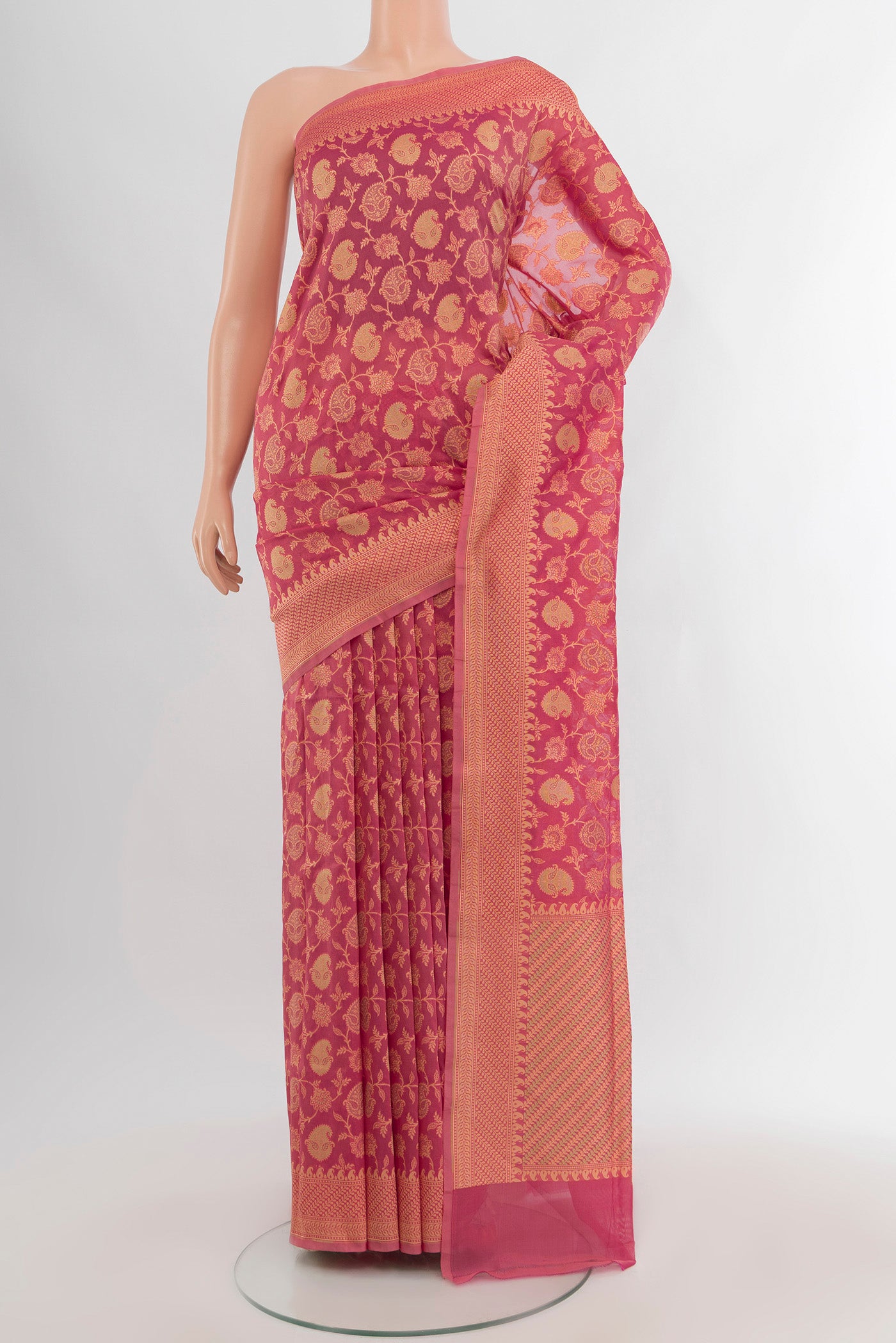 Pink Banarasi Silk Saree with Zari Butta on the body and Zari Border.  displayed on a mannequin