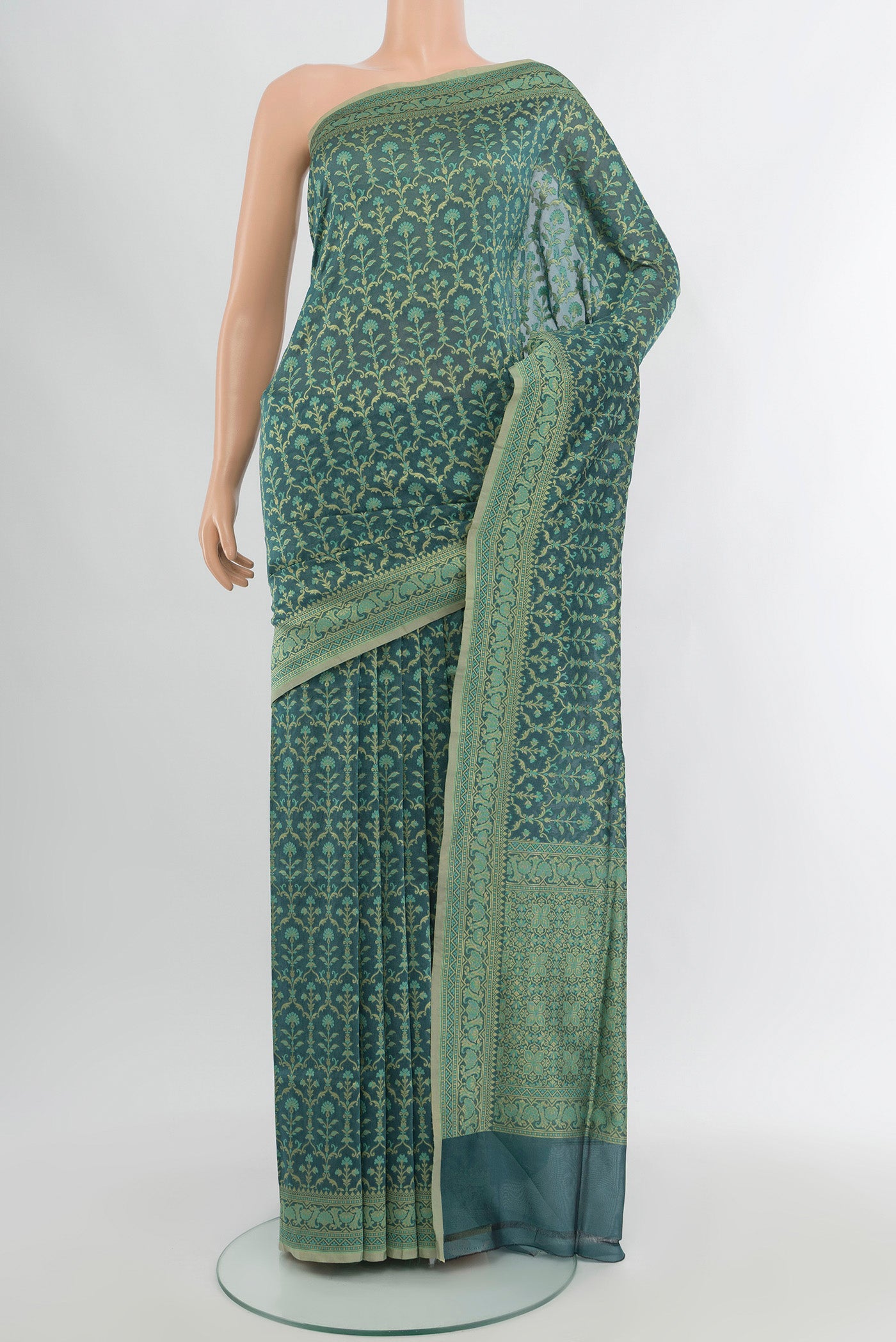 Blue Grey Banarasi Silk Saree with Zari Butta on the body and Zari Border.  displayed on a mannequin