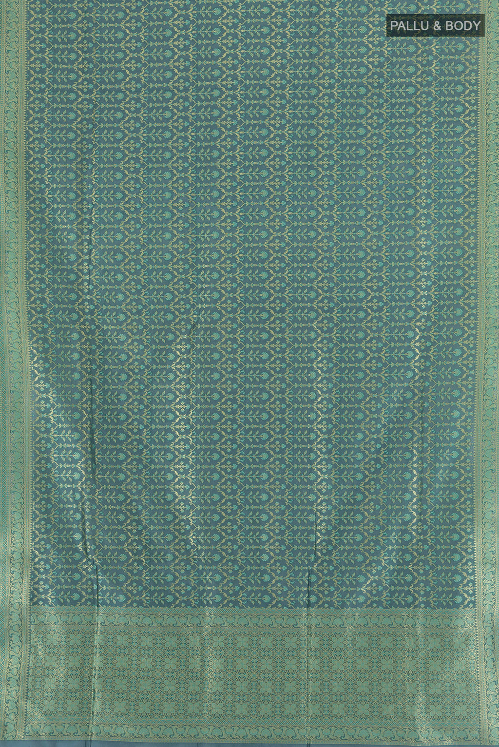 Flat view of Blue Grey Banarasi Silk Saree with Zari Butta on the body and Zari Border. 
