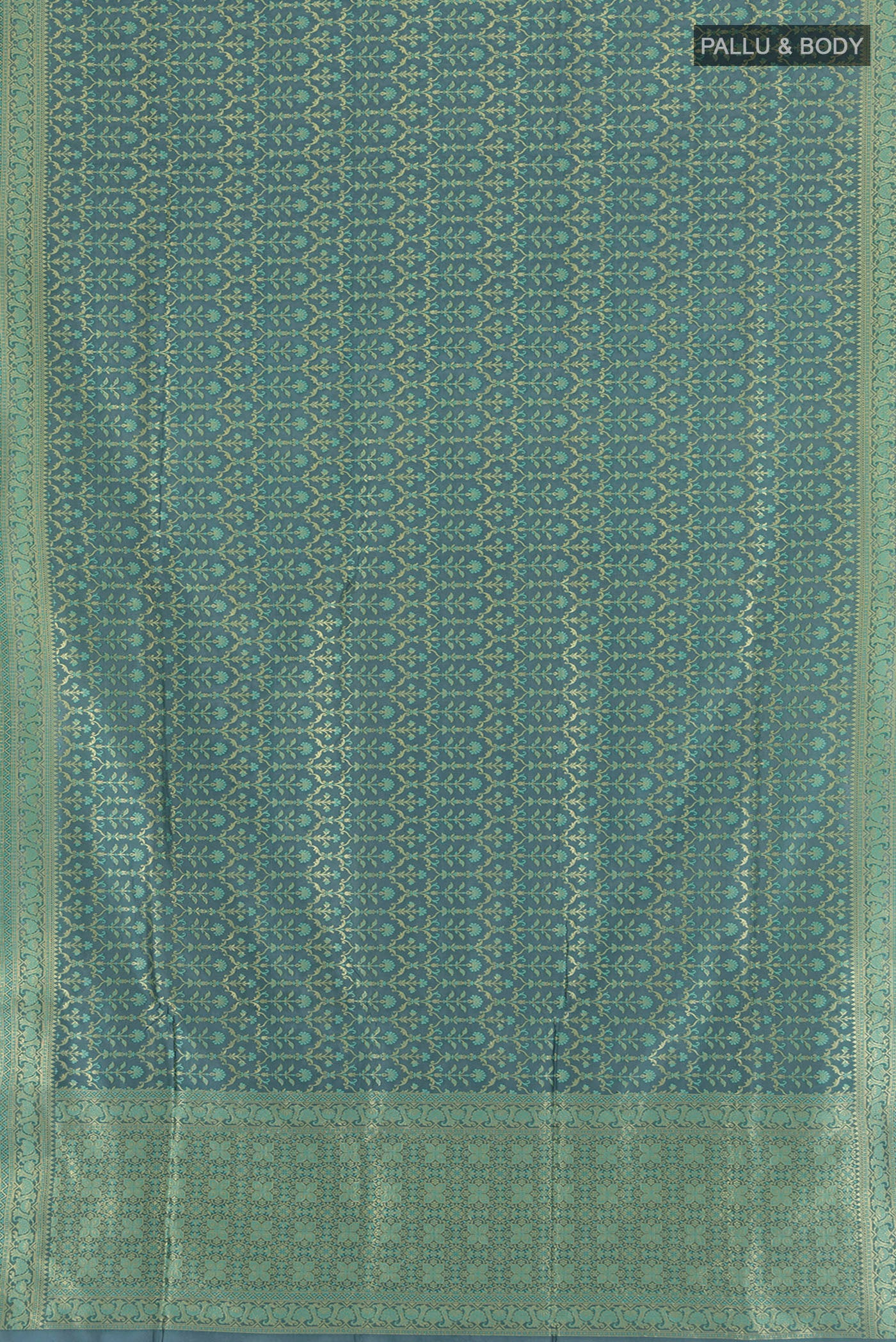 Flat view of Blue Grey Banarasi Silk Saree with Zari Butta on the body and Zari Border. 