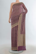 Pure Silk Mauve Banarasi Saree with Thread Butta on the body and Thread Border.  displayed on a mannequin