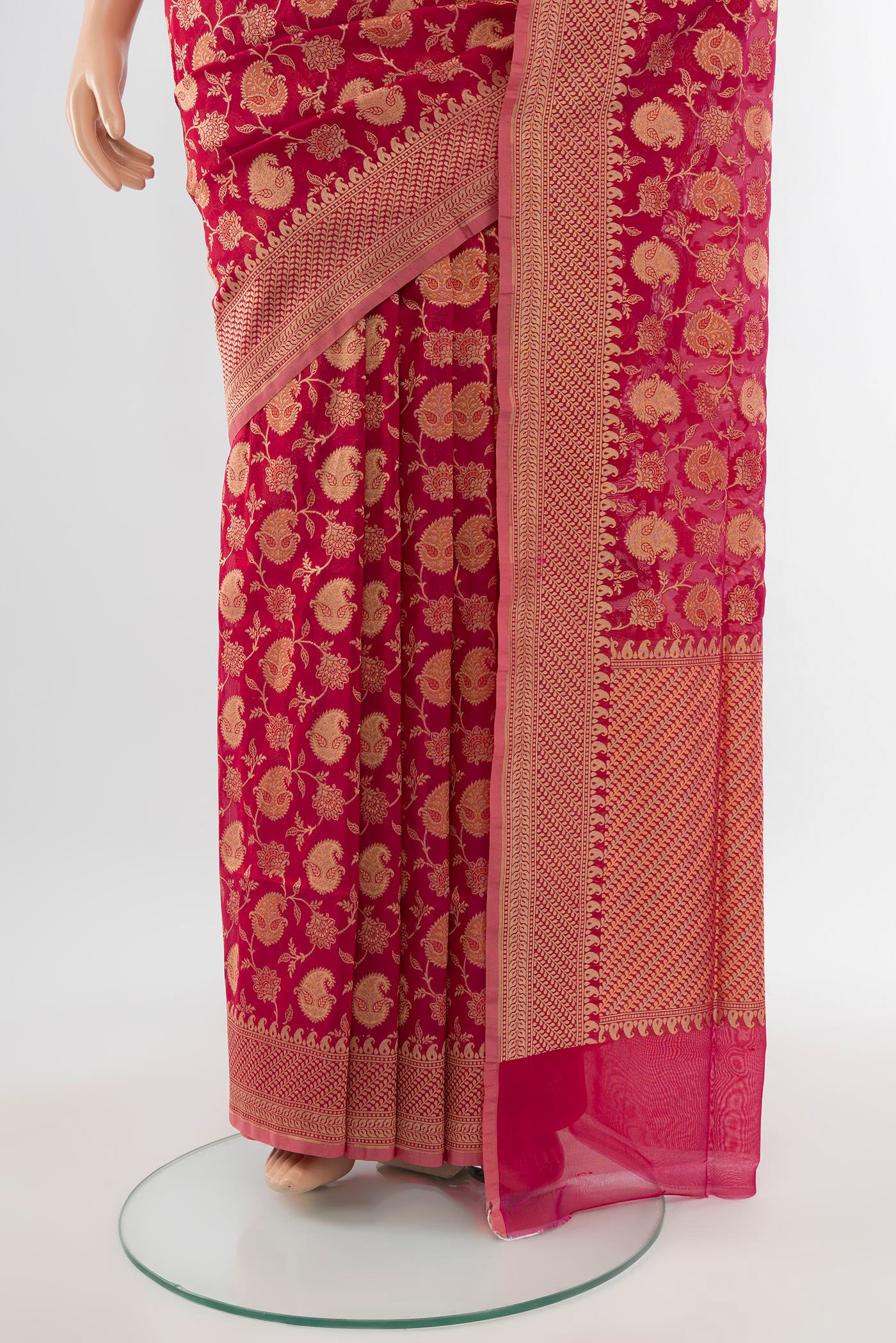 Pleats and pallu of Peach Banarasi Silk Saree with Zari Butta on the body and Silk Border. 