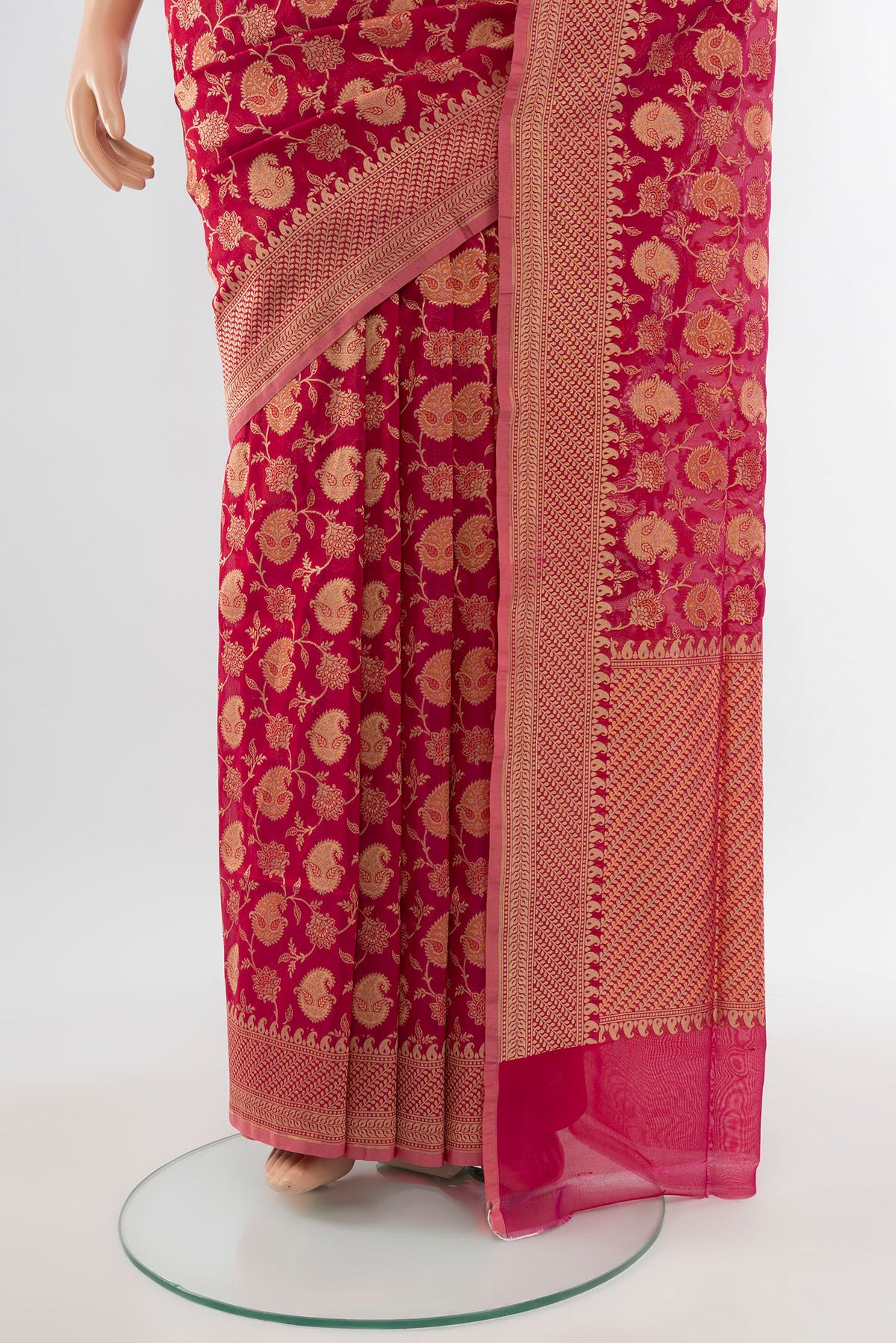 Pleats and pallu of Peach Banarasi Silk Saree with Zari Butta on the body and Silk Border. 