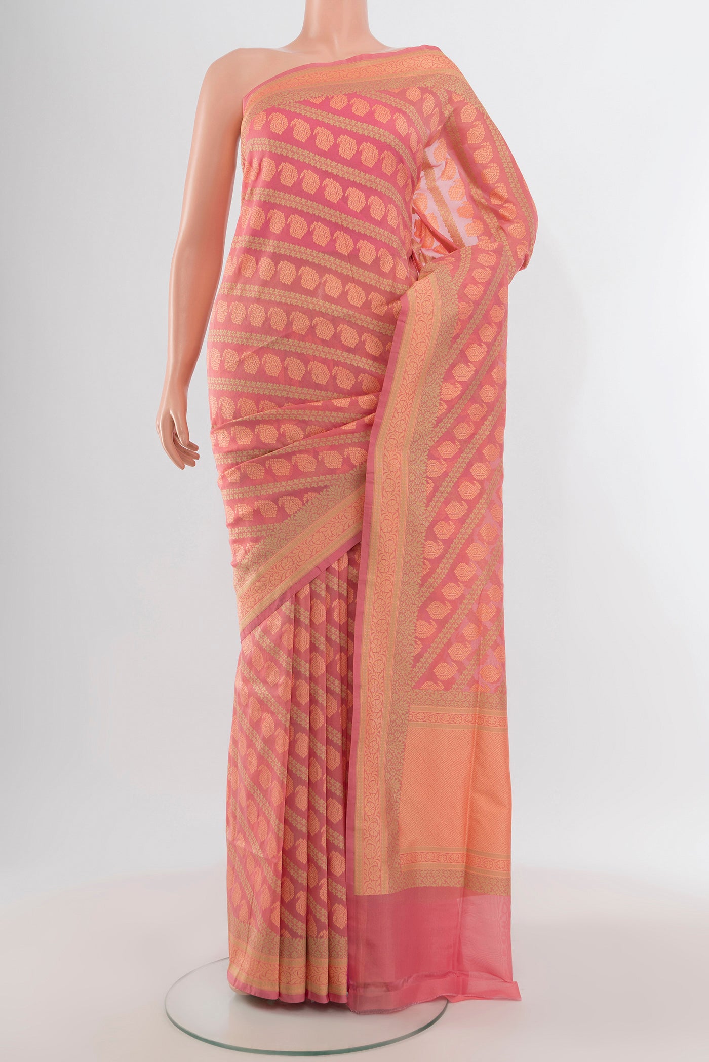 Rose pink Banarasi Silk Saree with Zari Butta on the body and Zari Border.  displayed on a mannequin