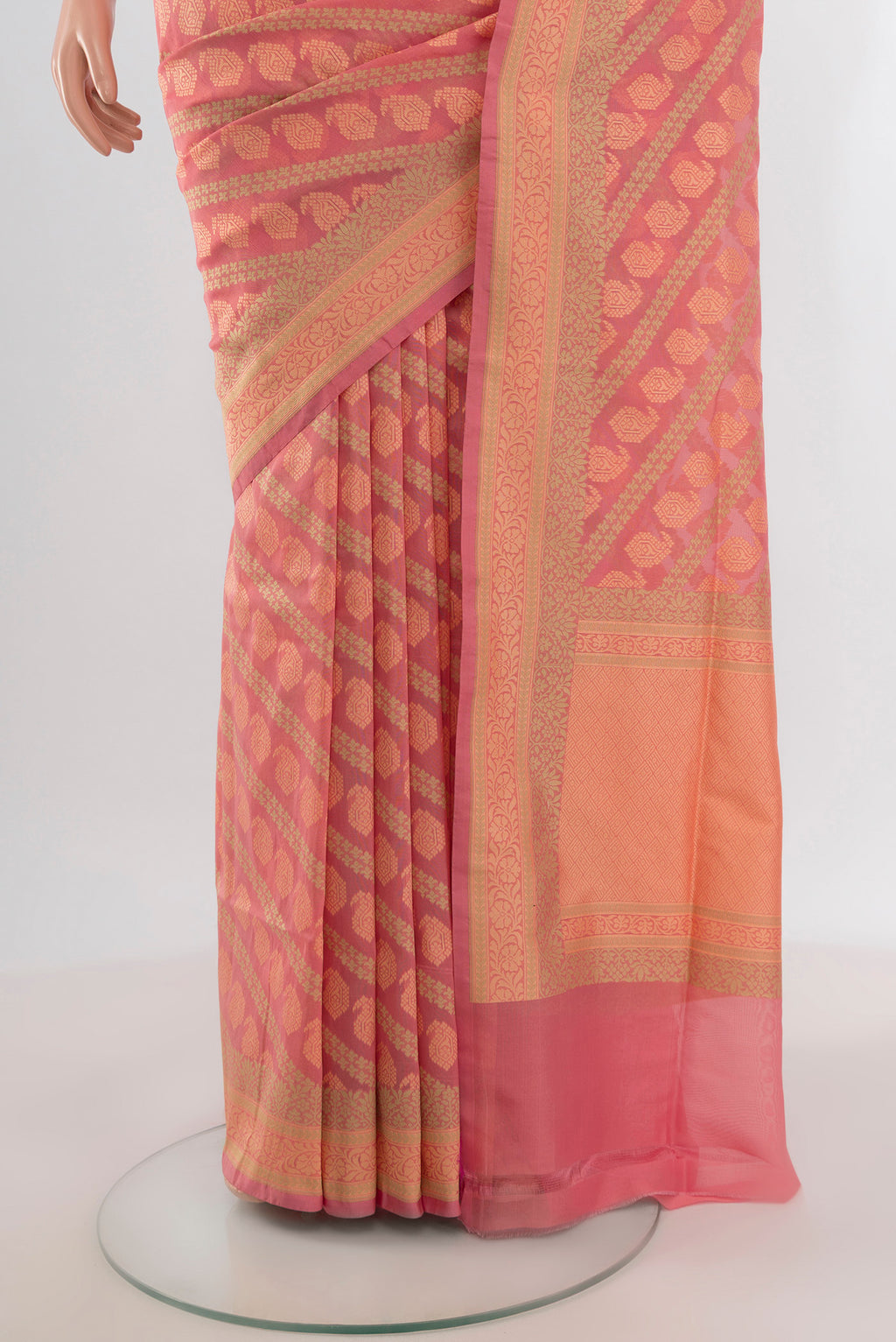 Pleats and pallu of Rose pink Banarasi Silk Saree with Zari Butta on the body and Zari Border. 
