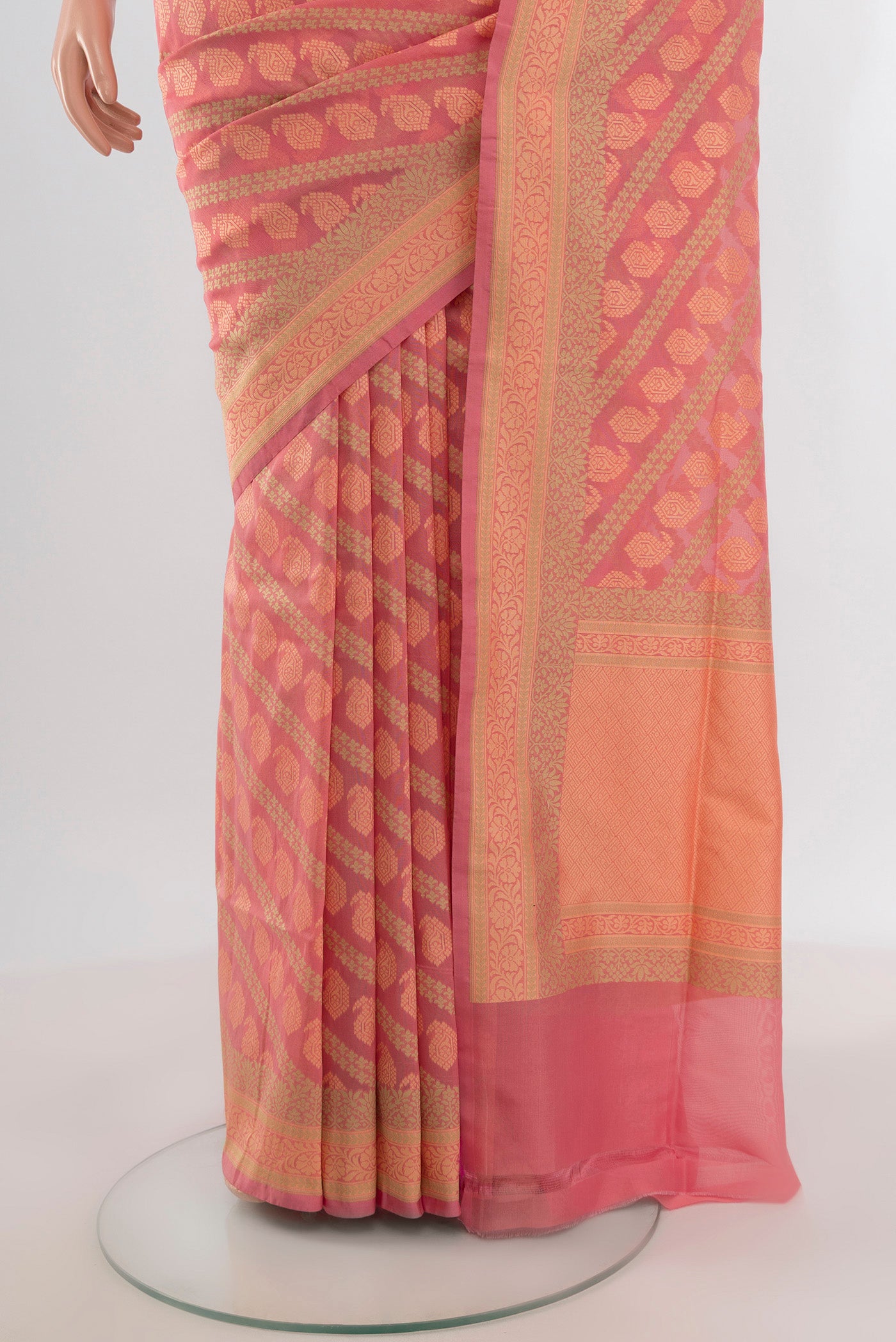 Pleats and pallu of Rose pink Banarasi Silk Saree with Zari Butta on the body and Zari Border. 