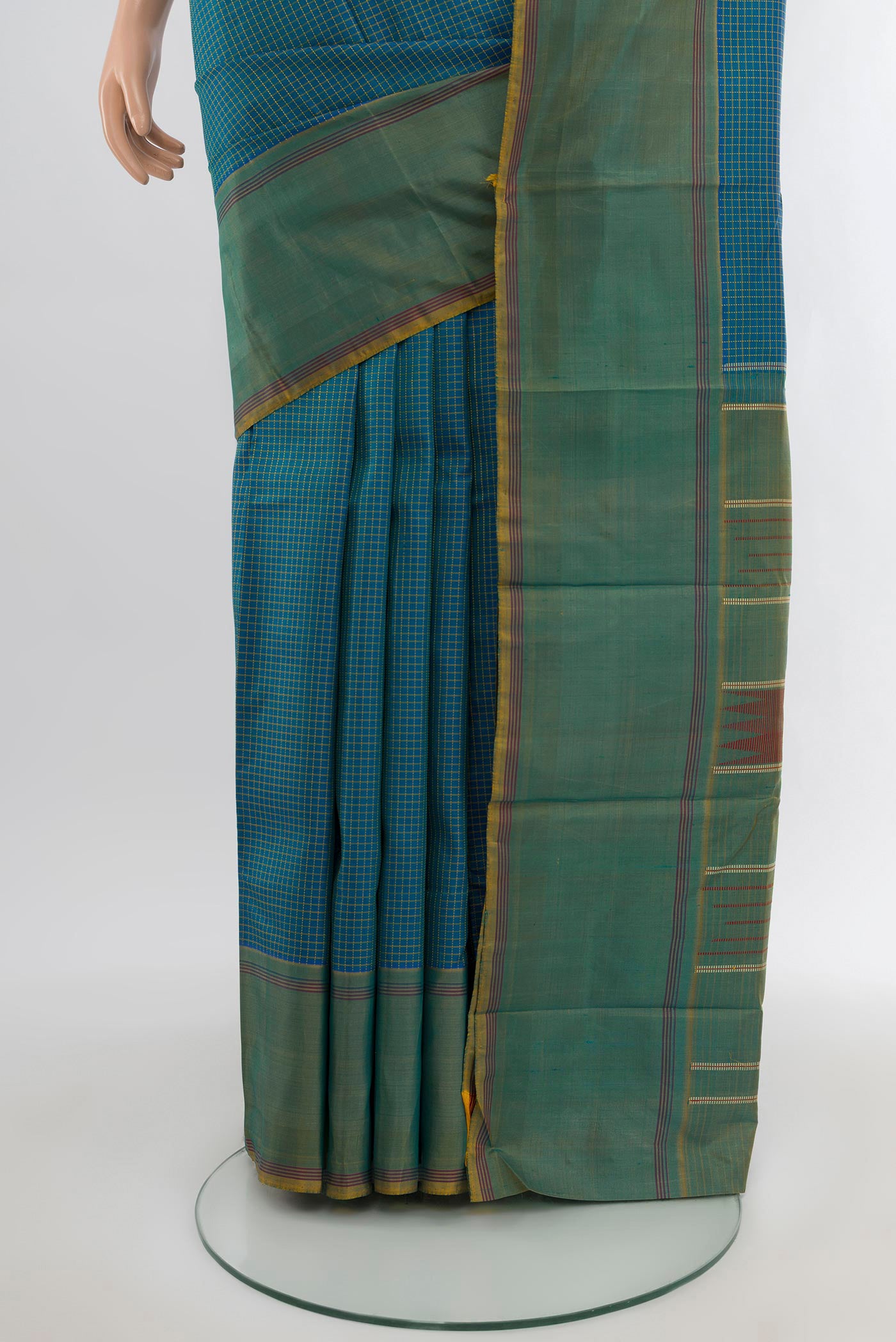 Pleats and pallu of Peacock Blue Kanchipuram Silk Saree with Checked design on the body and Plain Border. 