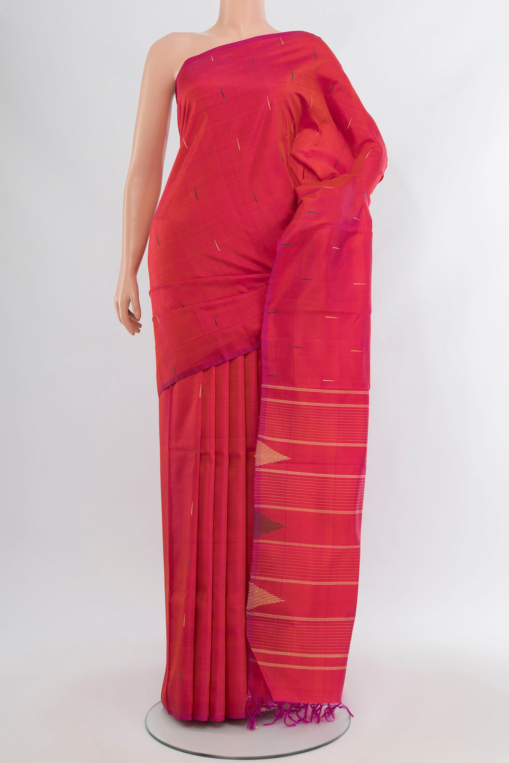 Pink Kanchipuram Silk Saree with Thread Butta on the body and Temple Border.  displayed on a mannequin