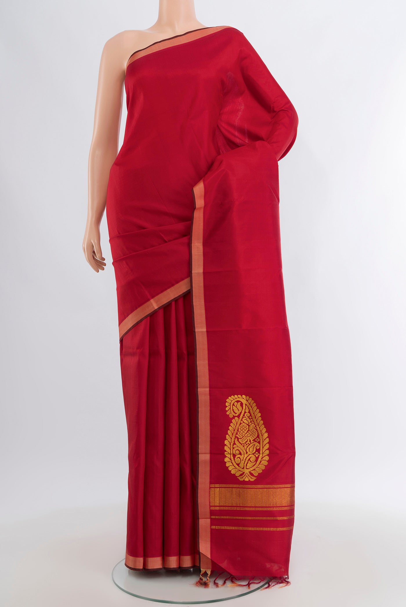 Maroon Kanchipuram Silk Saree with Plain Body and Plain Border.  displayed on a mannequin