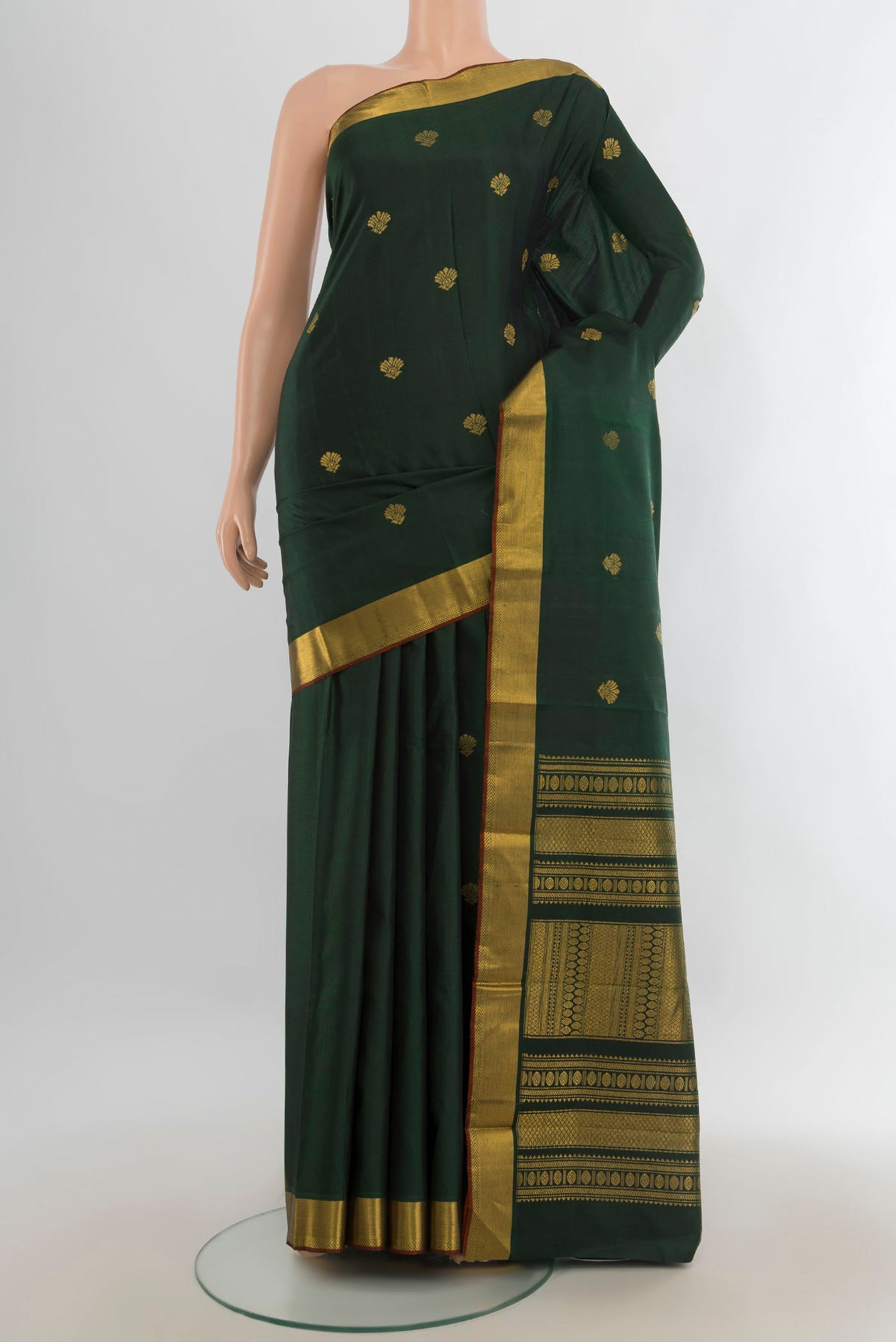 Pure Silk Pure Zari Sea Green Kanjivaram Saree with Zari Butta on the body and Silk Border.  displayed on a mannequin