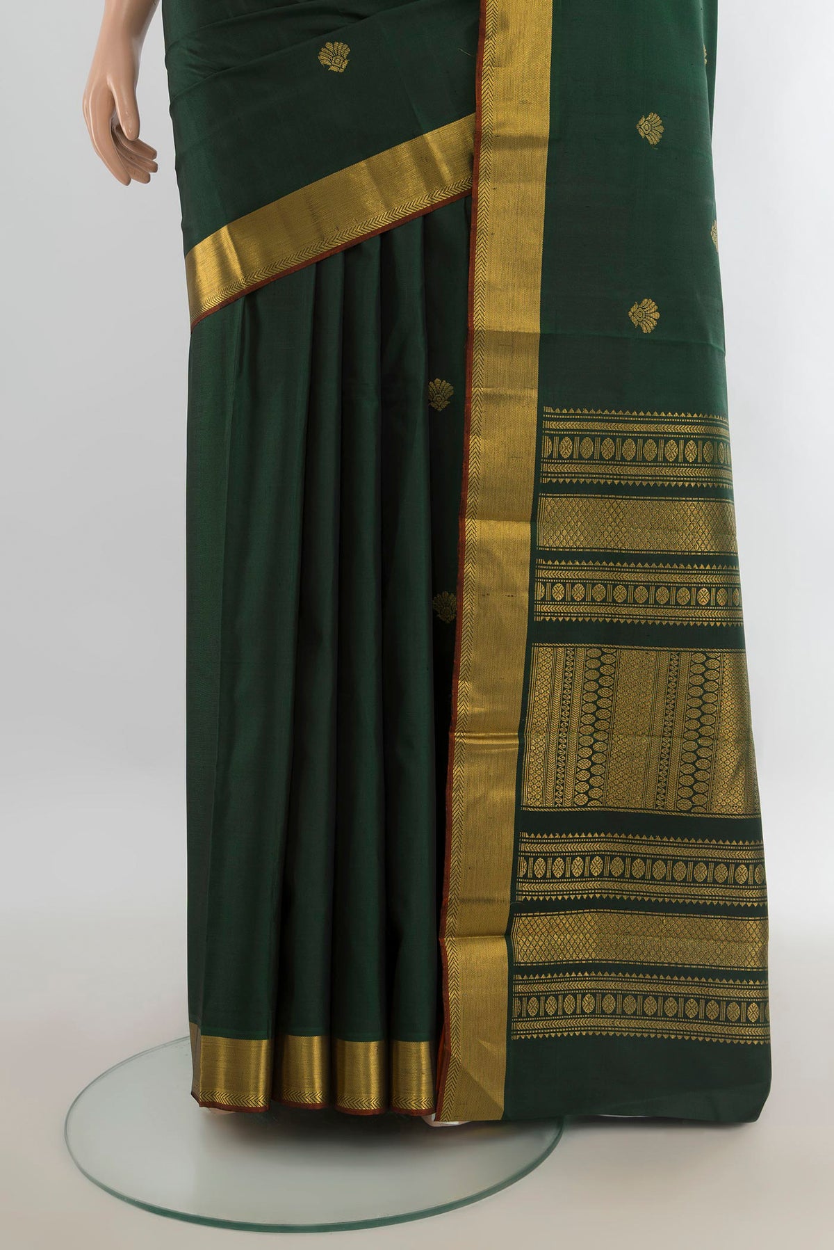 Pleats and pallu of Pure Silk Pure Zari Sea Green Kanjivaram Saree with Zari Butta on the body and Silk Border. 