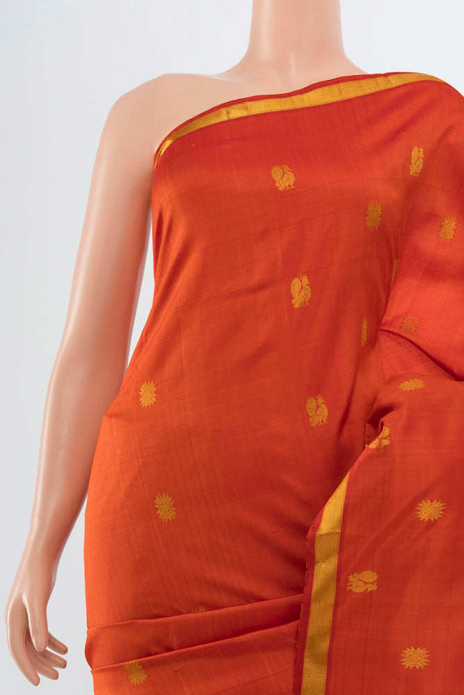 Border image of Brick Orange Kanjivaram Silk Saree with Zari Butta on the body and Silk Border. 