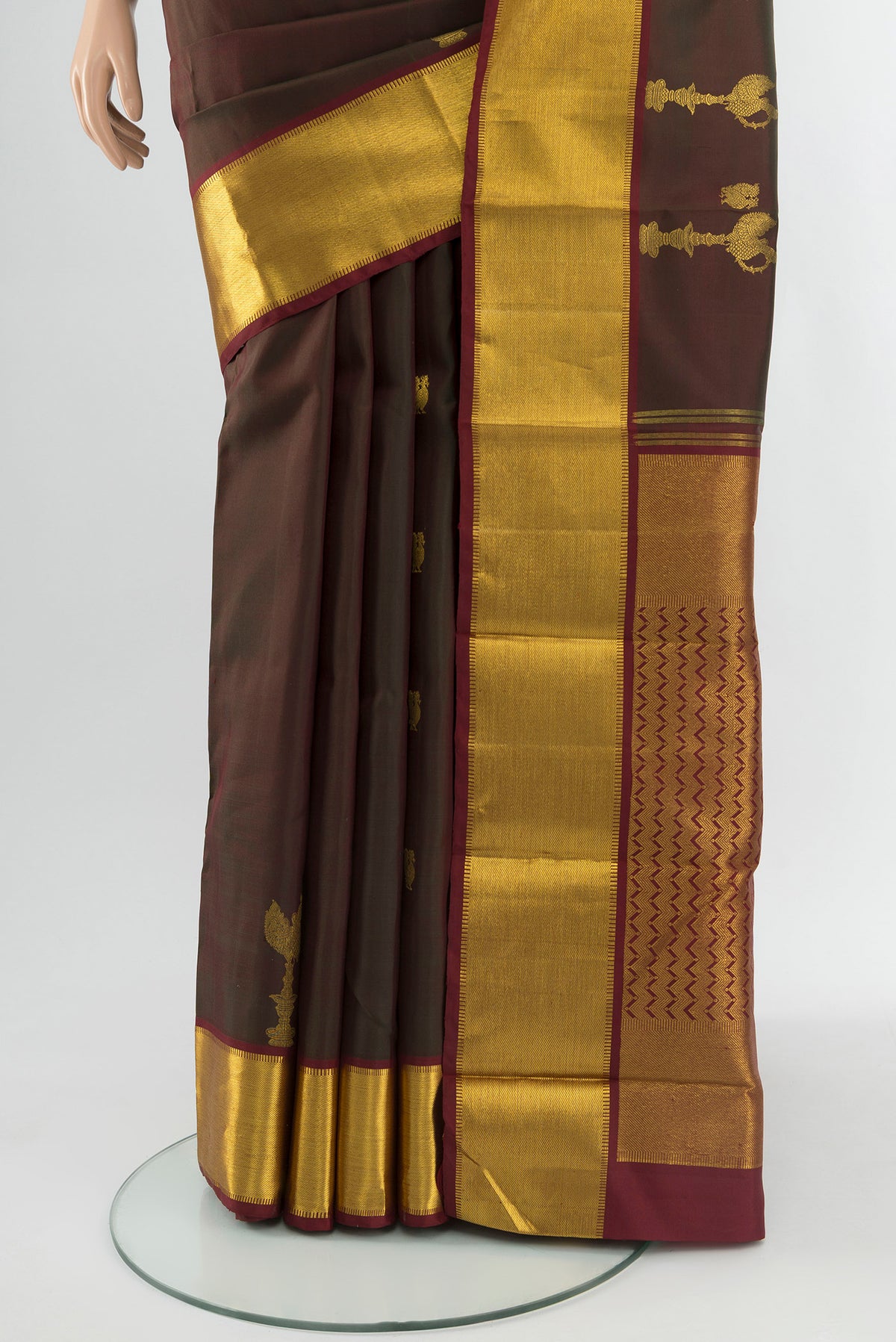 Pleats and pallu of Multi Color Kanjivaram Silk Saree with Zari Butta on the body and Zari Border. 